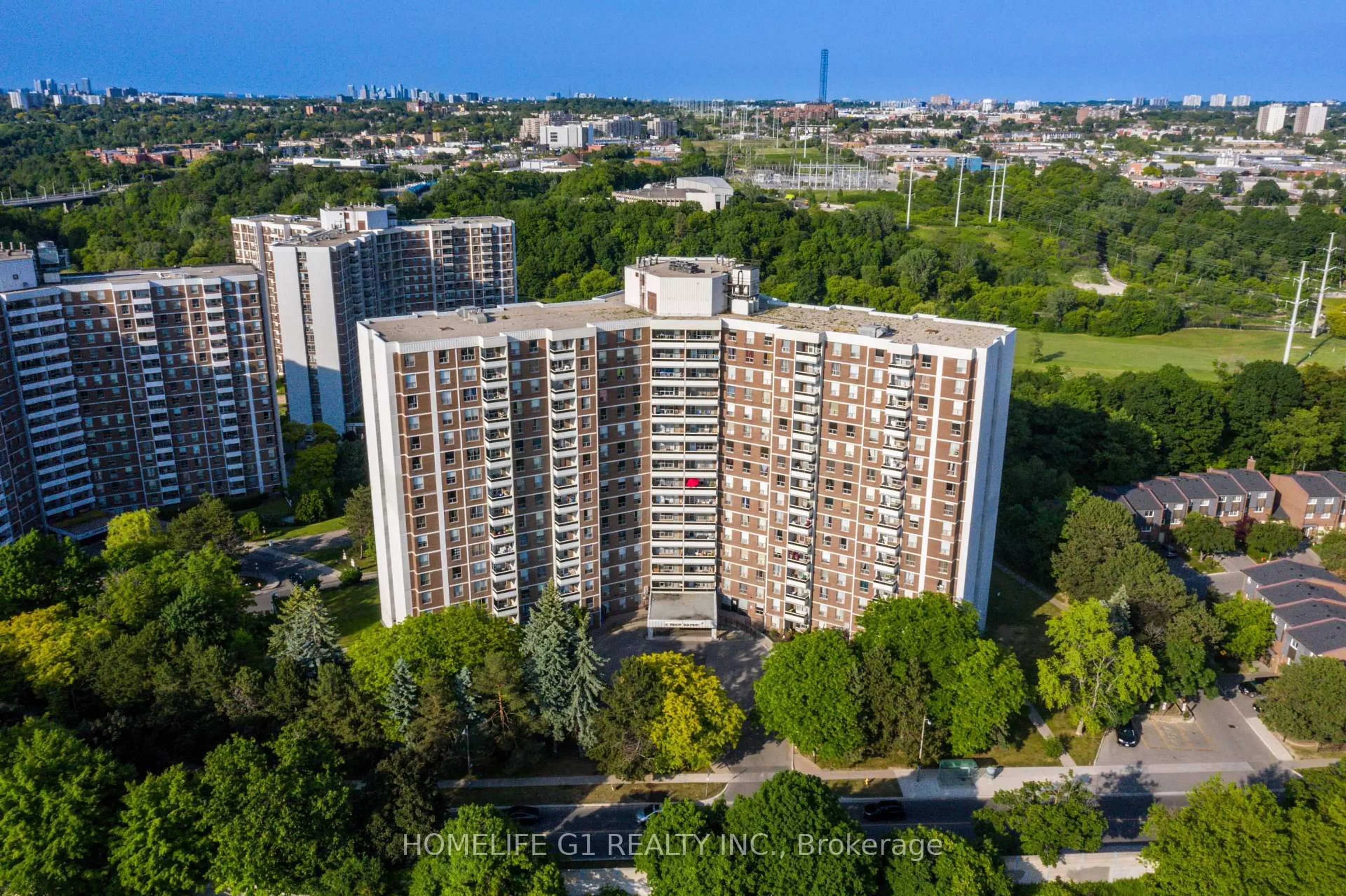 A pic from outside/outdoor area/front of a property/back of a property/a pic from drone, city buildings view from balcony for 5 Shady Gfwy #706, Toronto Ontario M3C 3A5