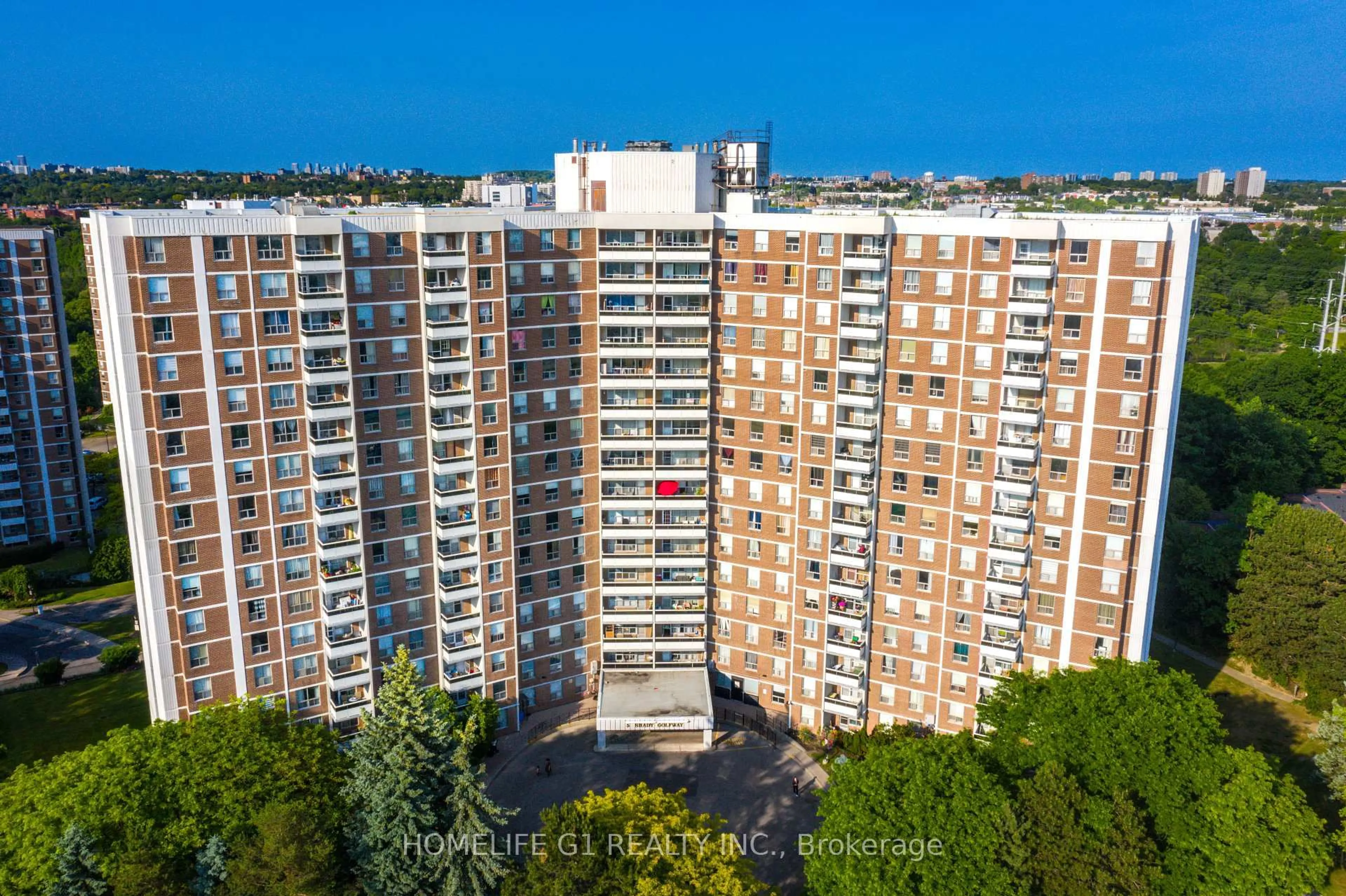 A pic from outside/outdoor area/front of a property/back of a property/a pic from drone, city buildings view from balcony for 5 Shady Gfwy #706, Toronto Ontario M3C 3A5