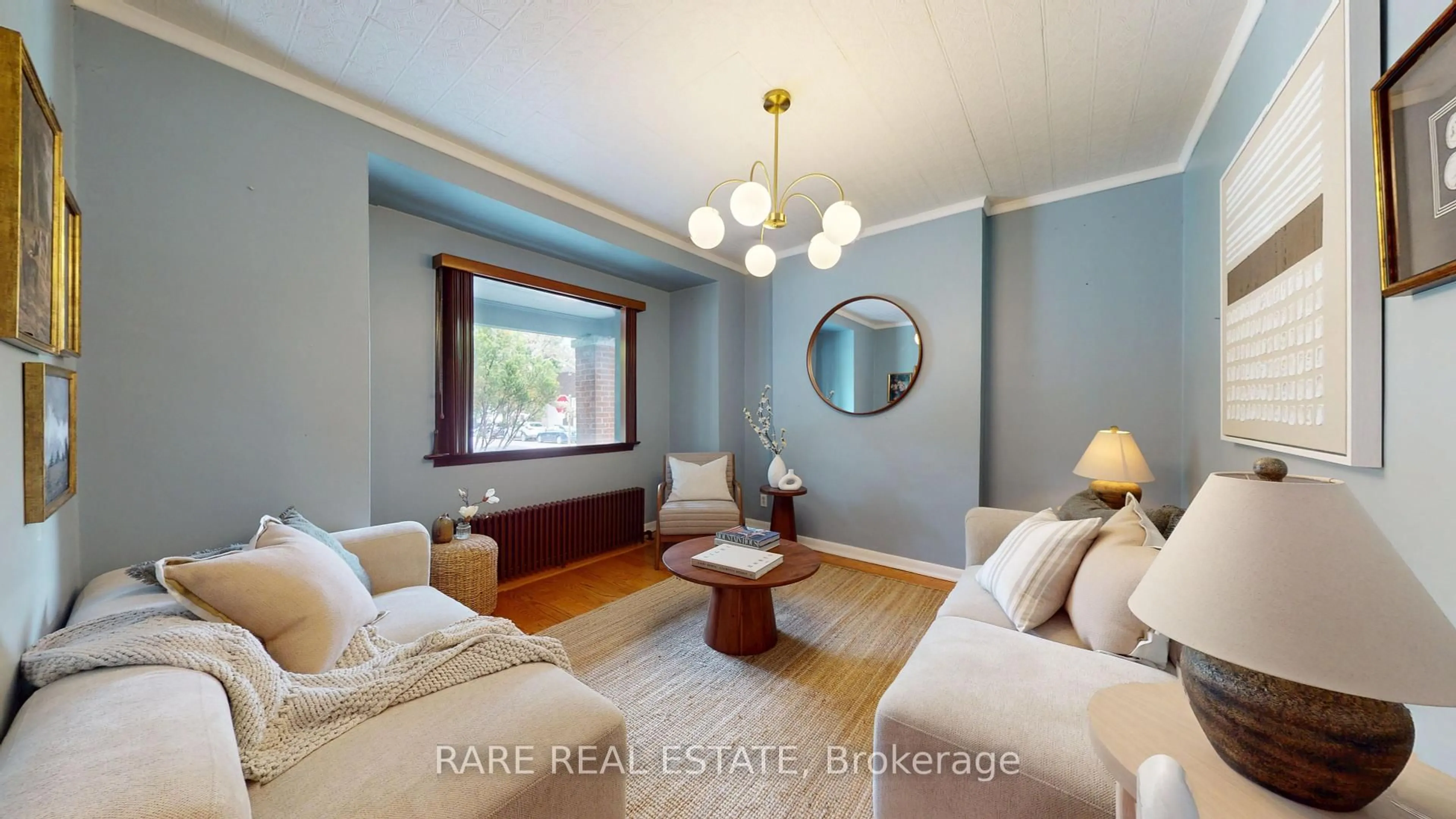 Living room with furniture, wood/laminate floor for 81 Bowood Ave, Toronto Ontario M4N 1Y3