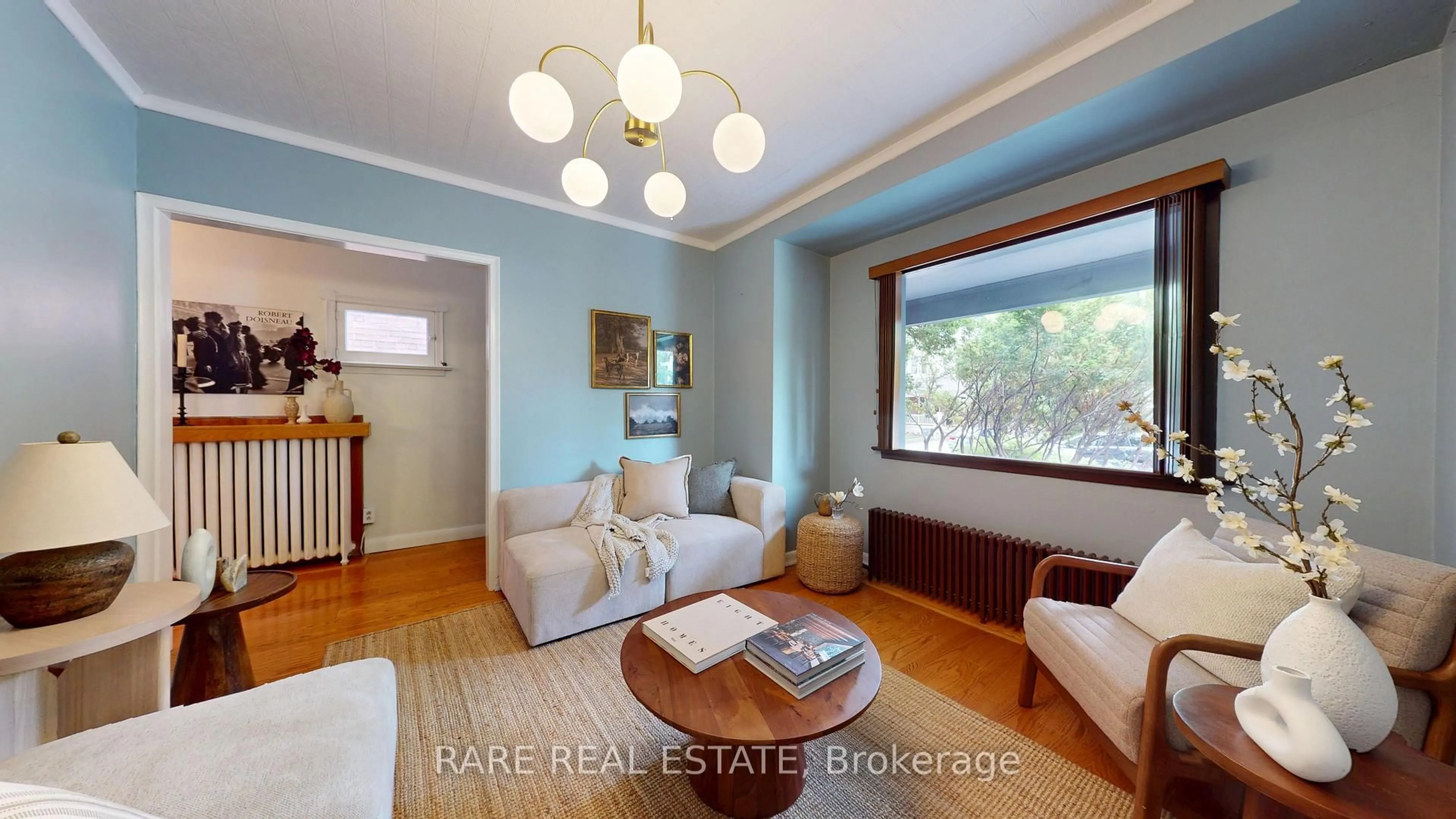 Living room with furniture, wood/laminate floor for 81 Bowood Ave, Toronto Ontario M4N 1Y3