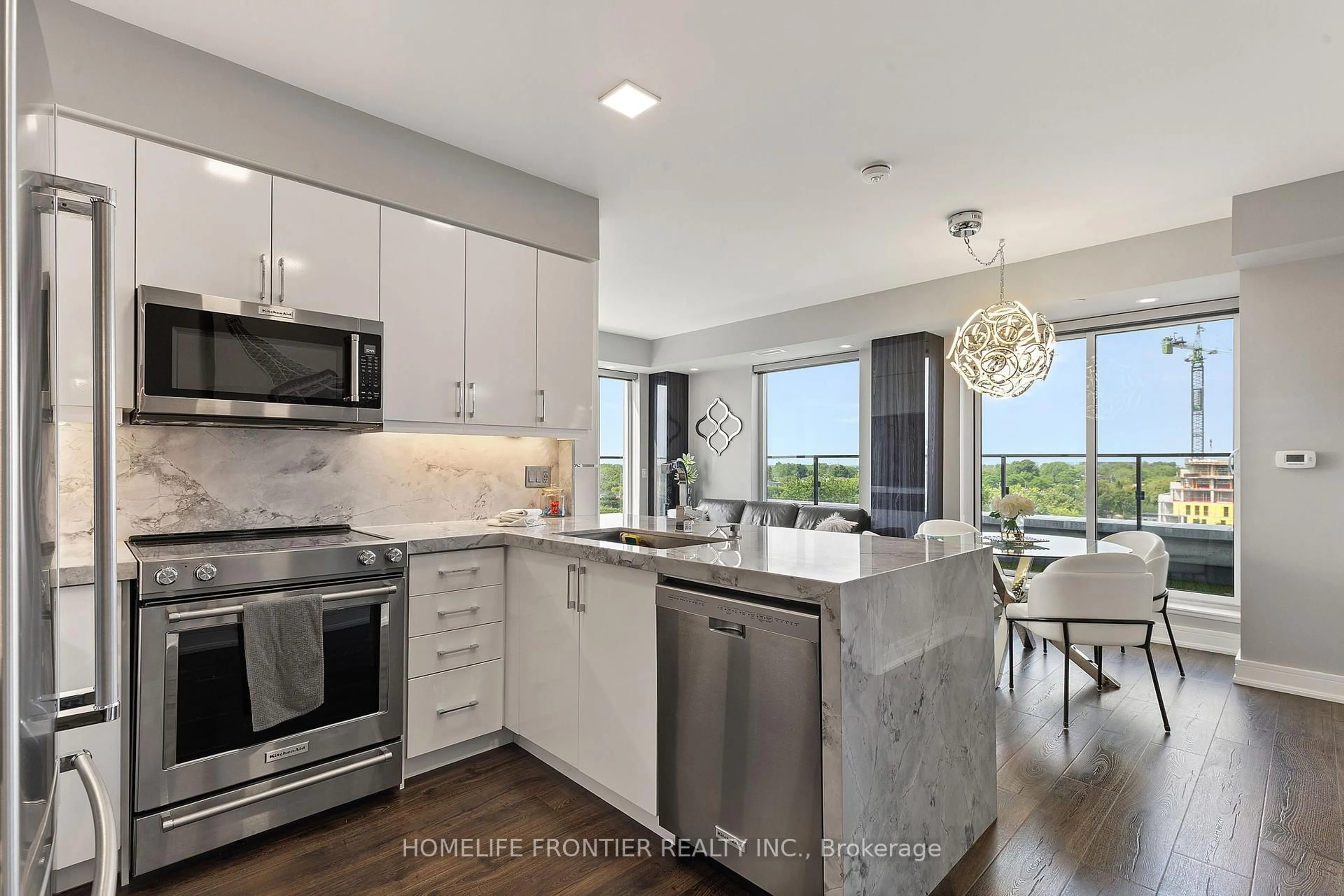 Open concept kitchen, ceramic/tile floor for 741 Sheppard Ave #803, Toronto Ontario M3H 0C9
