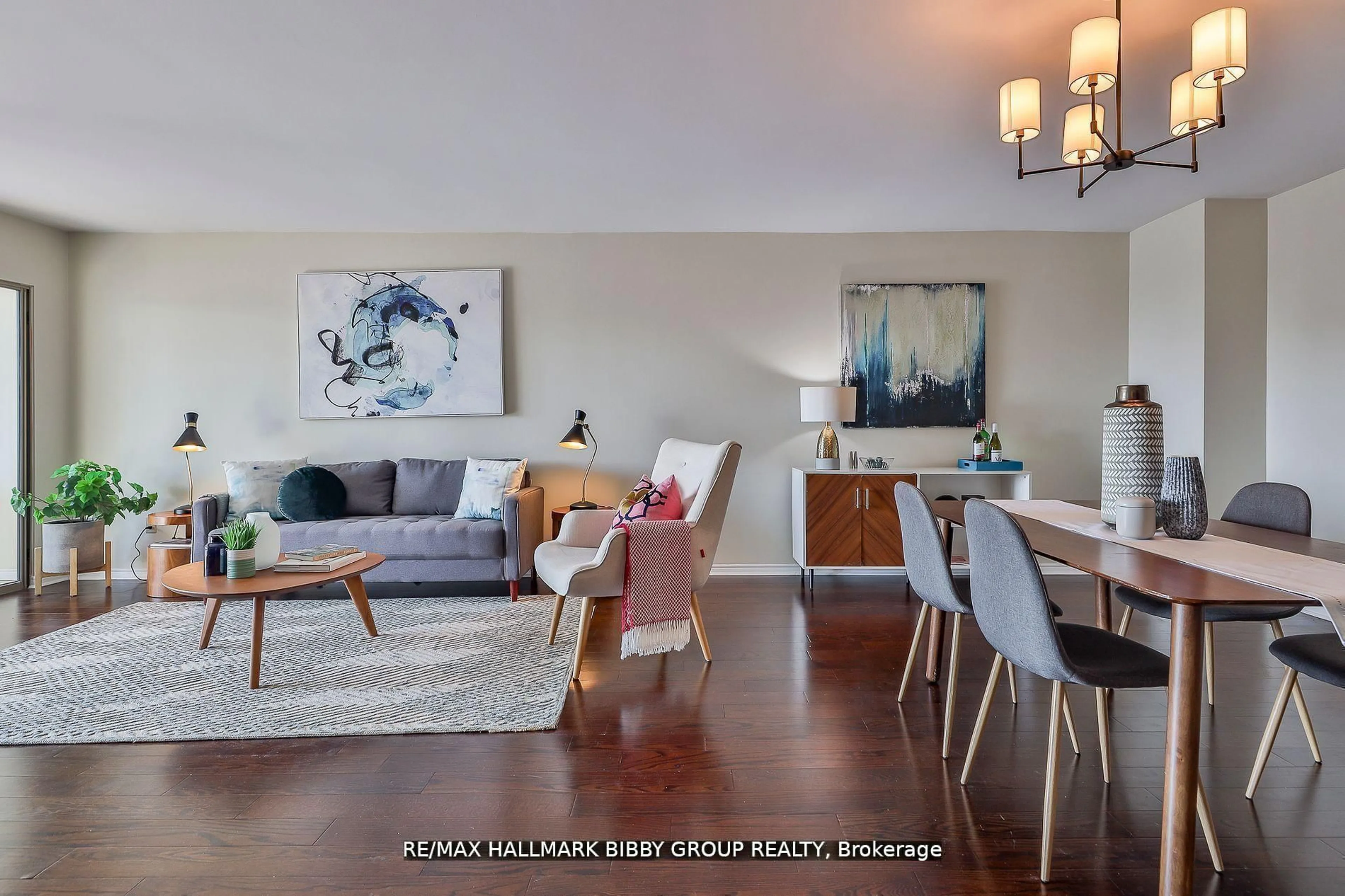 Living room with furniture, wood/laminate floor for 160 Frederick St #803, Toronto Ontario M5A 4H9