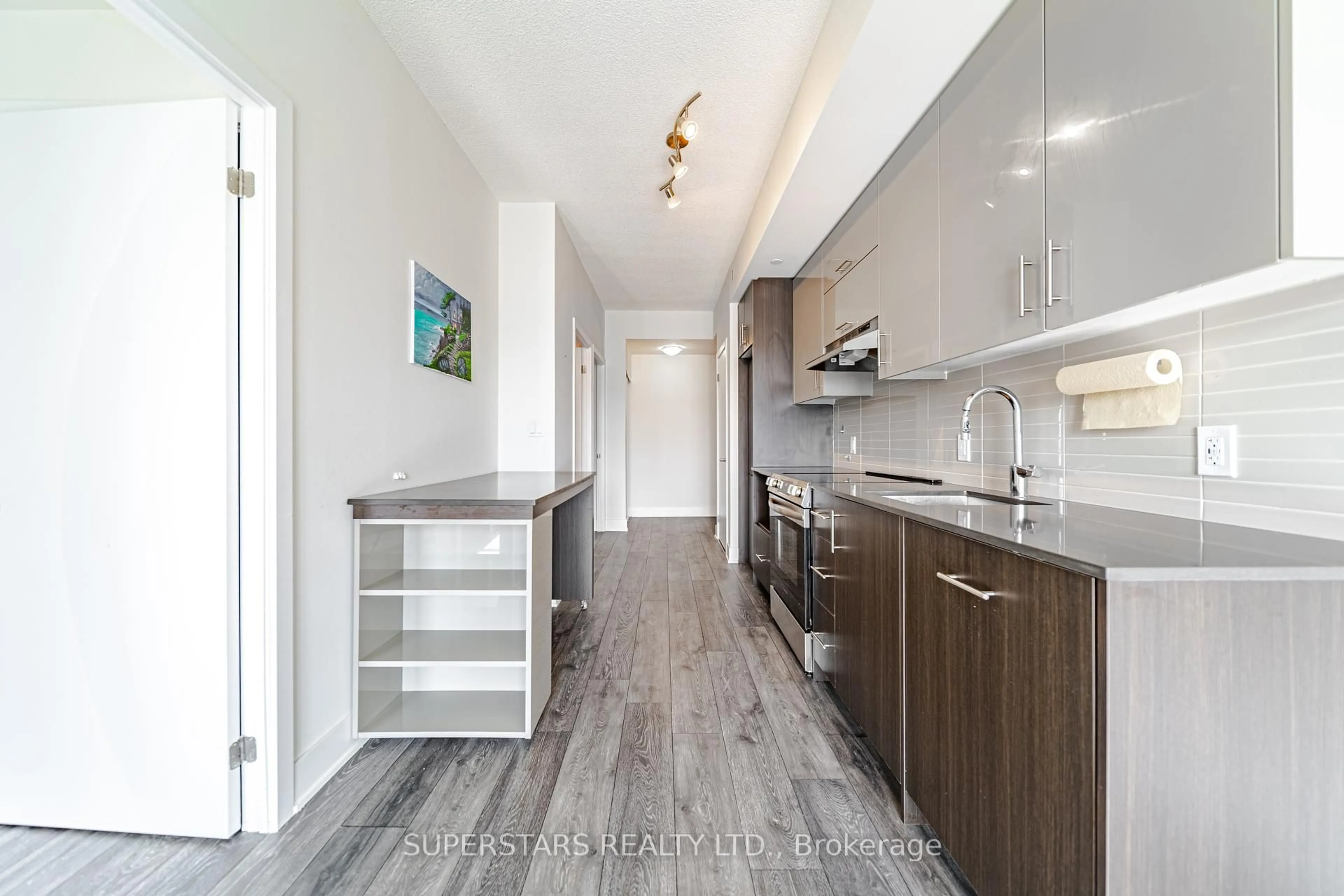 Open concept kitchen, wood/laminate floor for 188 Fairview Mall Dr #2216, Toronto Ontario M2J 0H7
