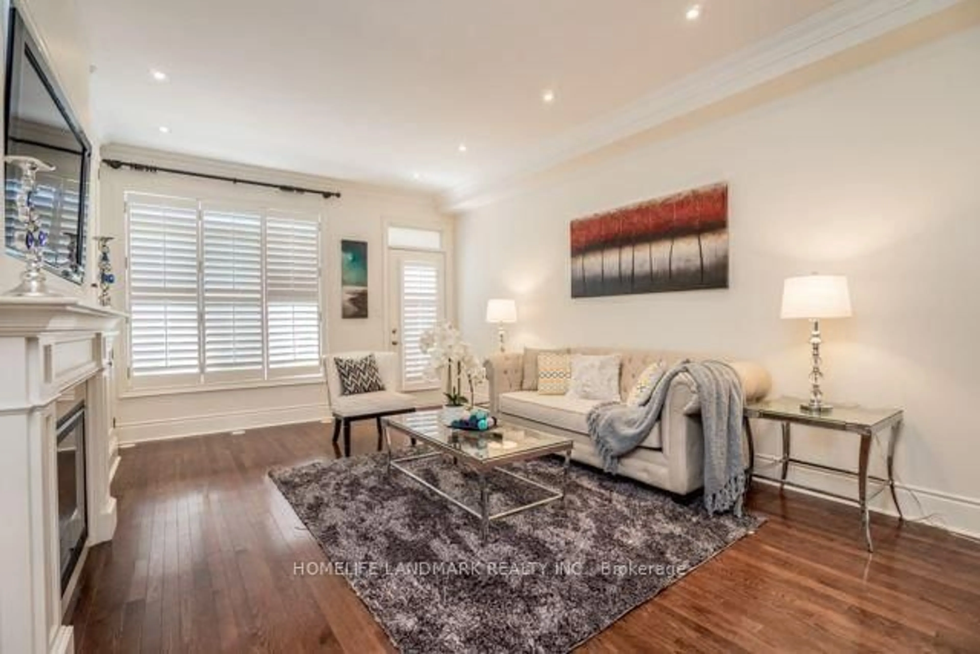 Living room with furniture, wood/laminate floor for 2 Espana Lane, Toronto Ontario M2N 7K8