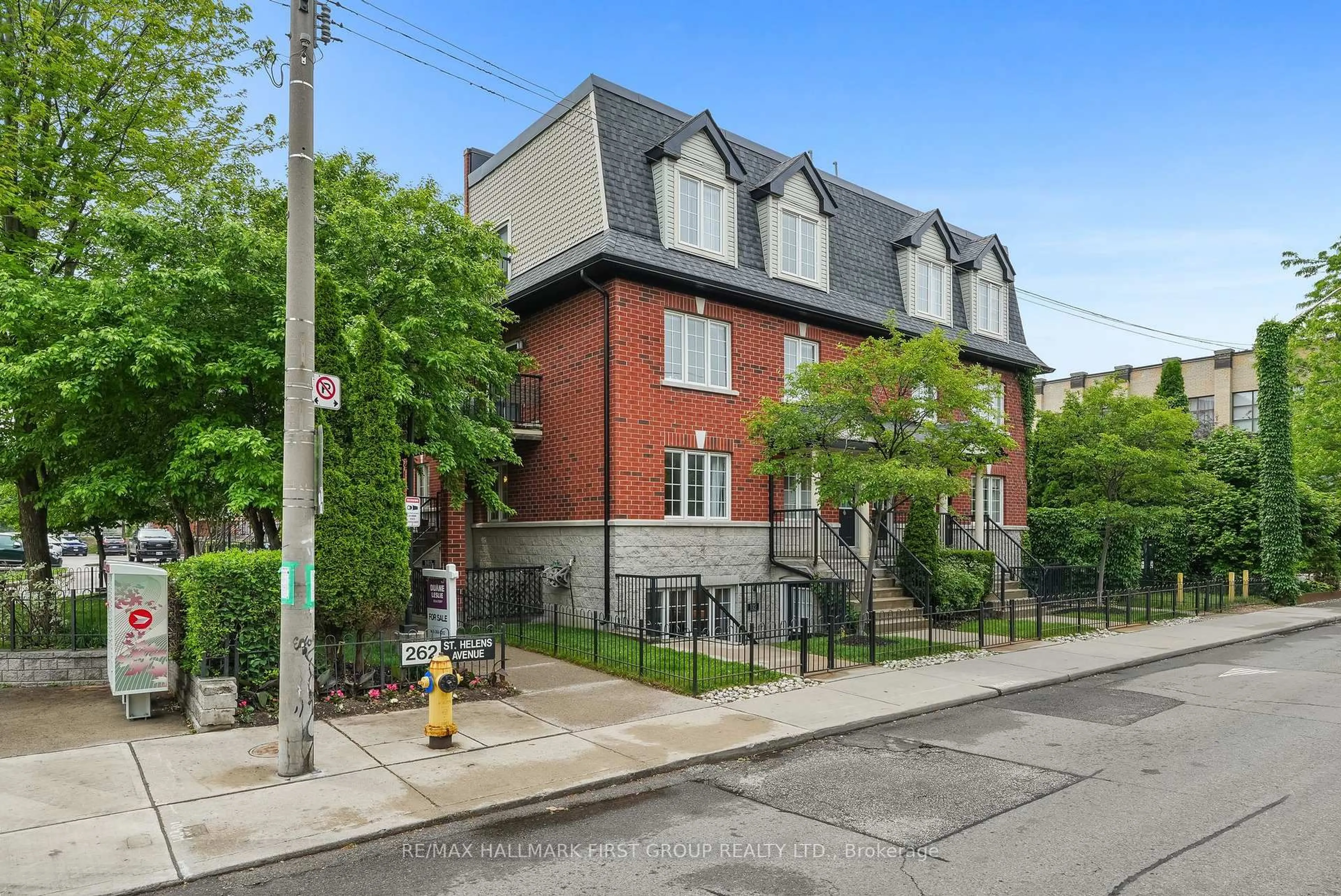 Home with brick exterior material, street for 262 St. Helen's Ave #102, Toronto Ontario M6H 4A4