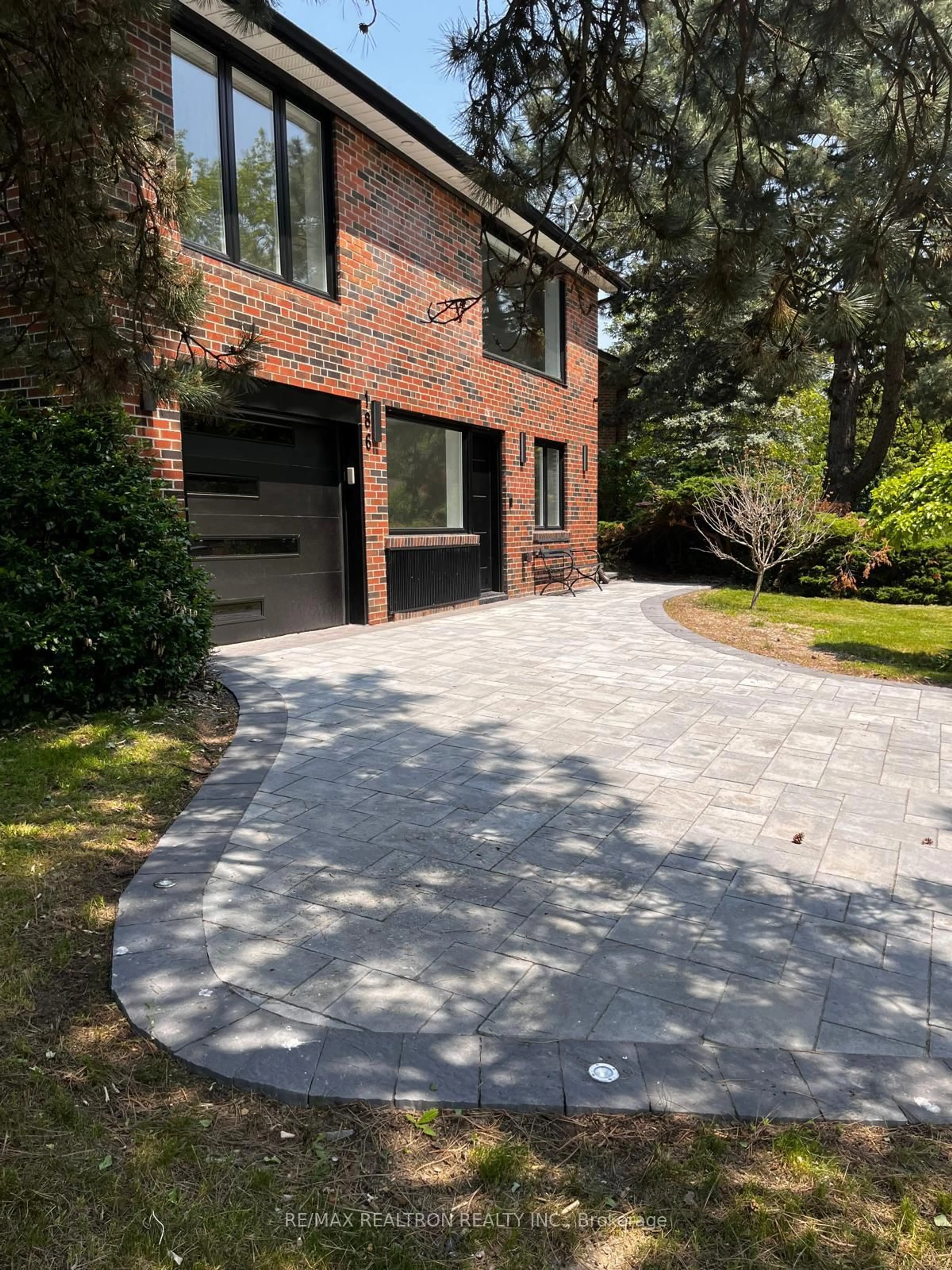 Home with brick exterior material, street for 186 Sweeney Dr, Toronto Ontario M4A 1V4