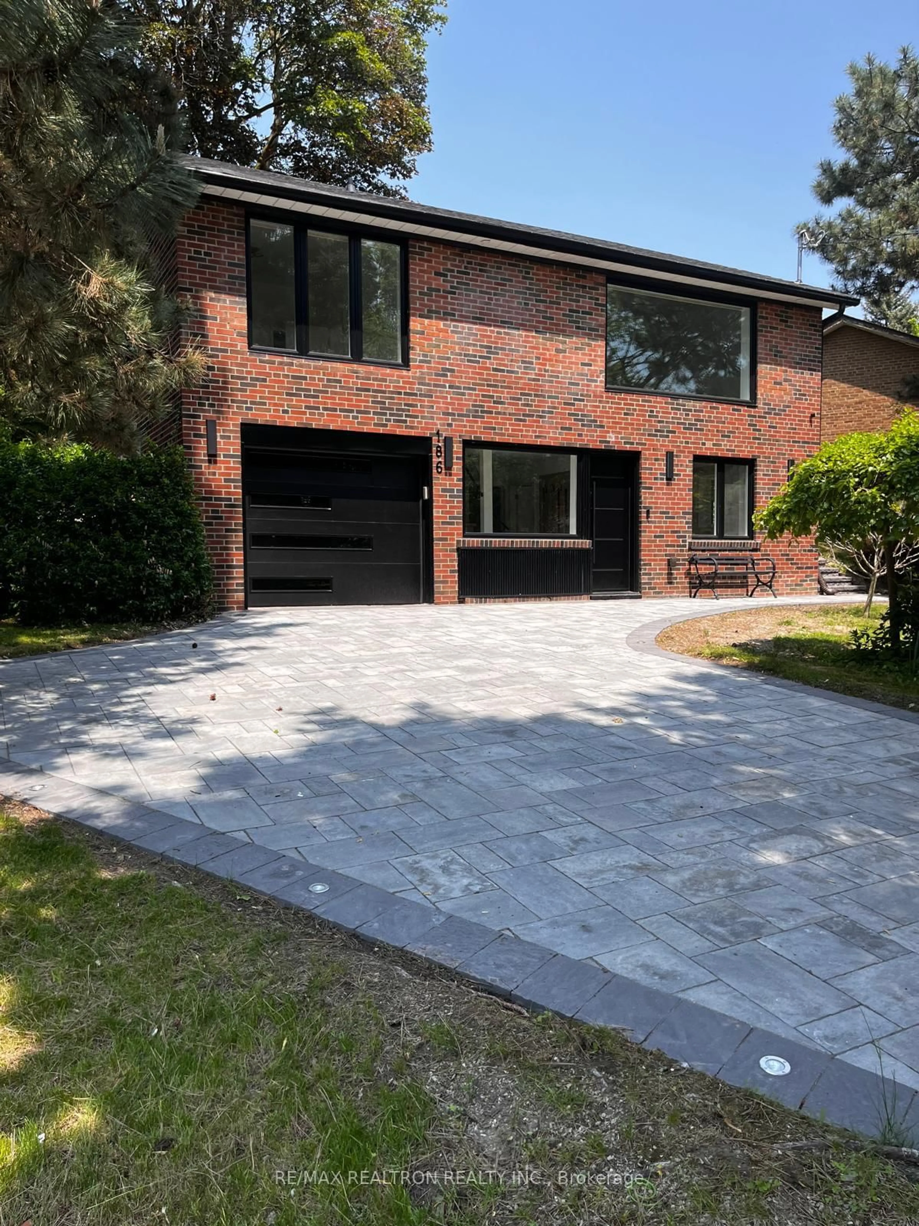 Home with brick exterior material, street for 186 Sweeney Dr, Toronto Ontario M4A 1V4