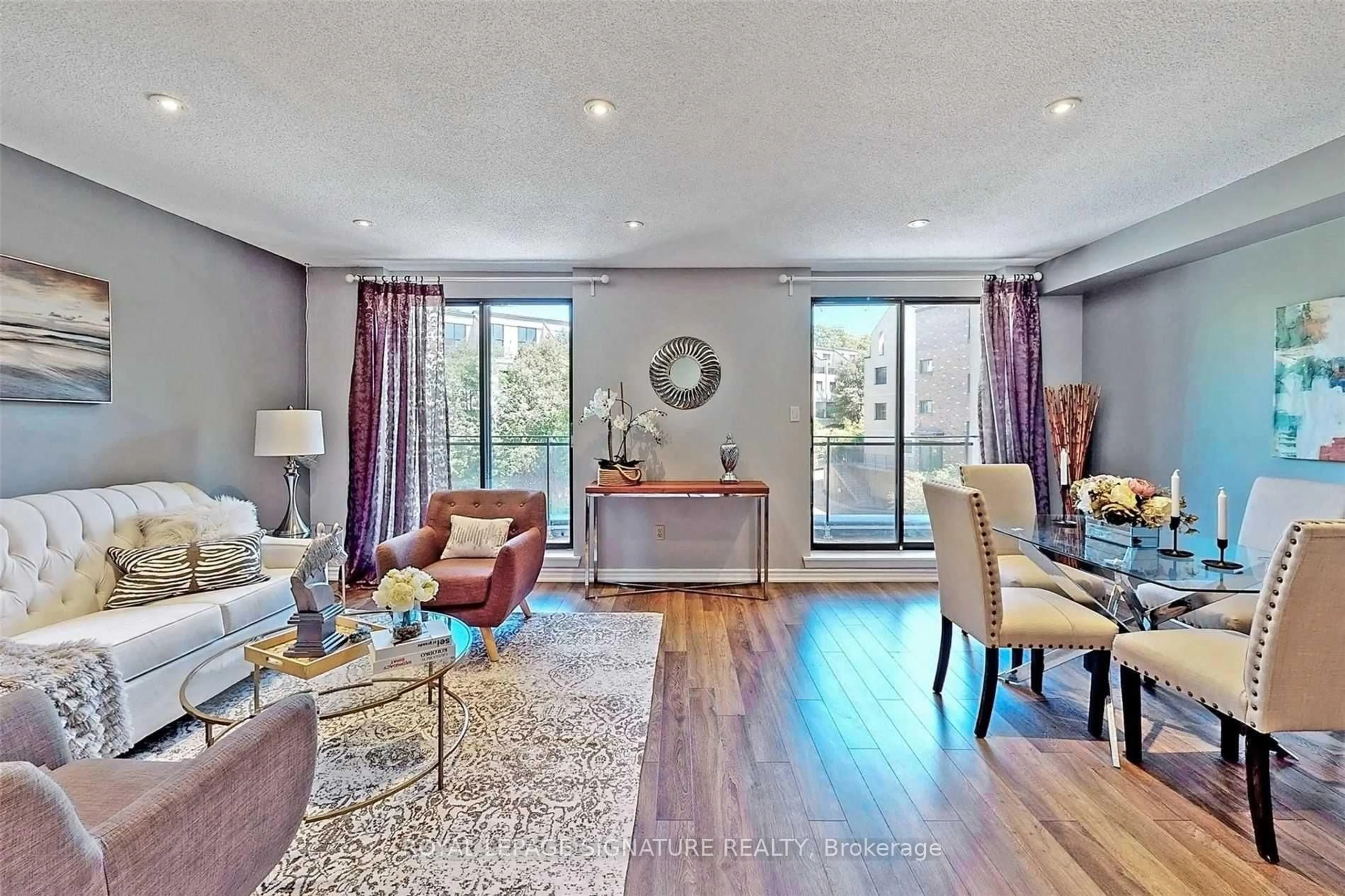 Living room with furniture, wood/laminate floor for 20 Moonstone Bywy #190, Toronto Ontario M2H 3J4