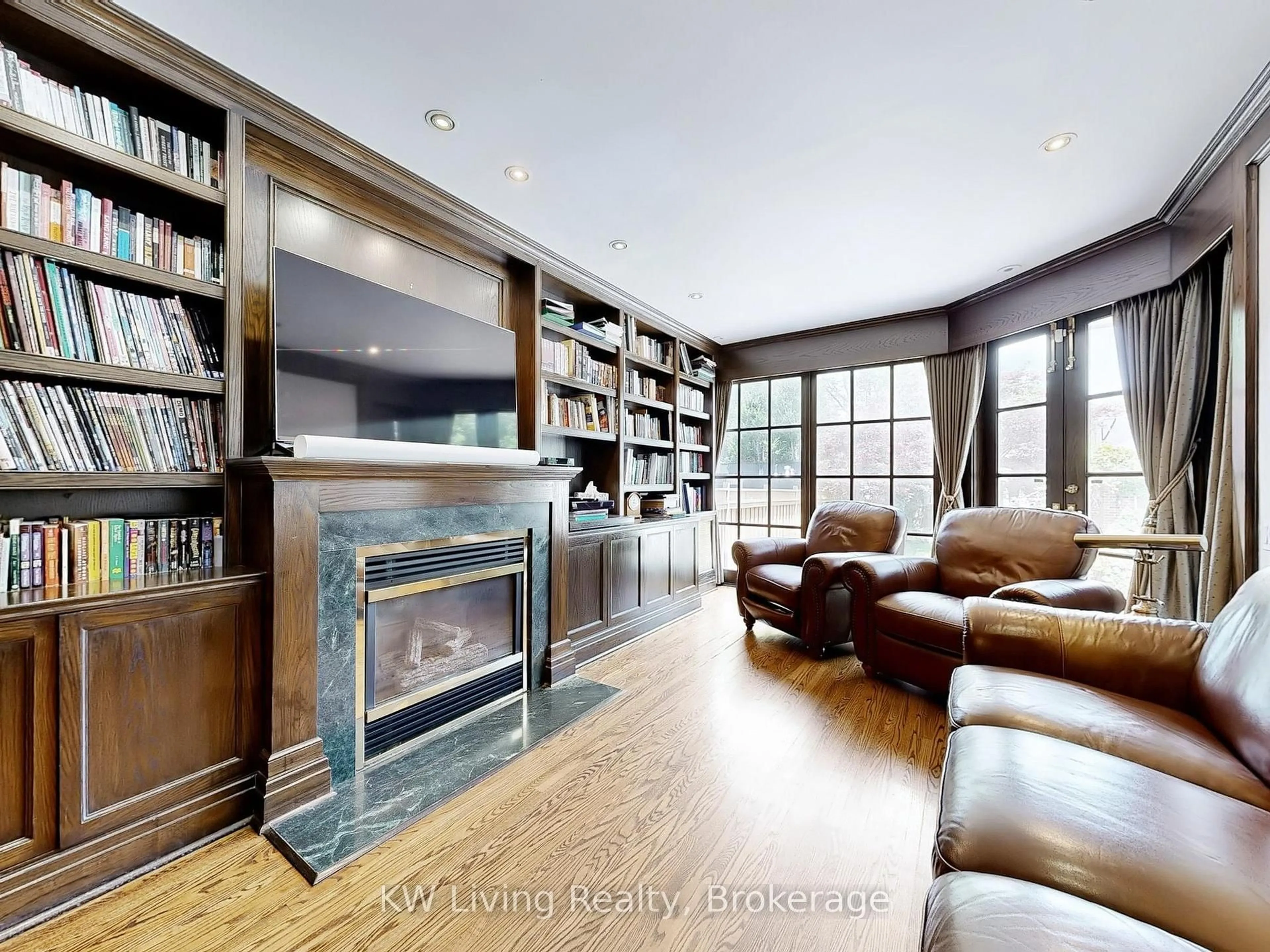 Living room with furniture, wood/laminate floor for 26 Wilberton Rd, Toronto Ontario M4V 1Z3