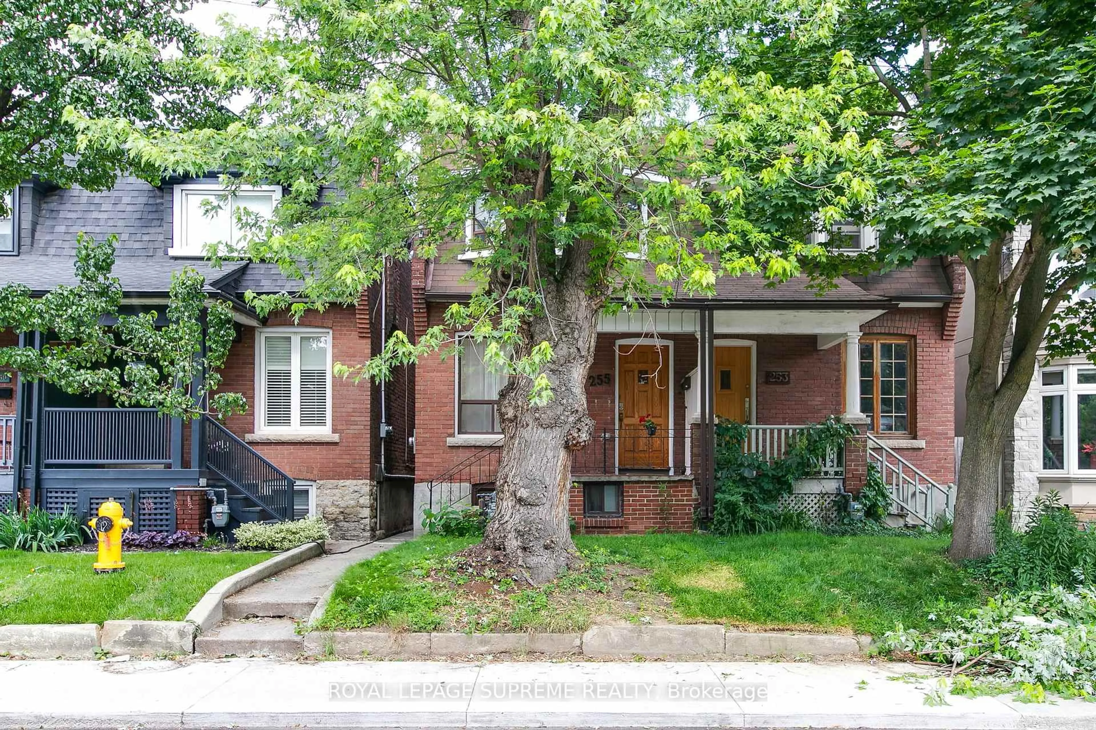 Home with brick exterior material, street for 255 Howland Ave, Toronto Ontario M5R 3B7