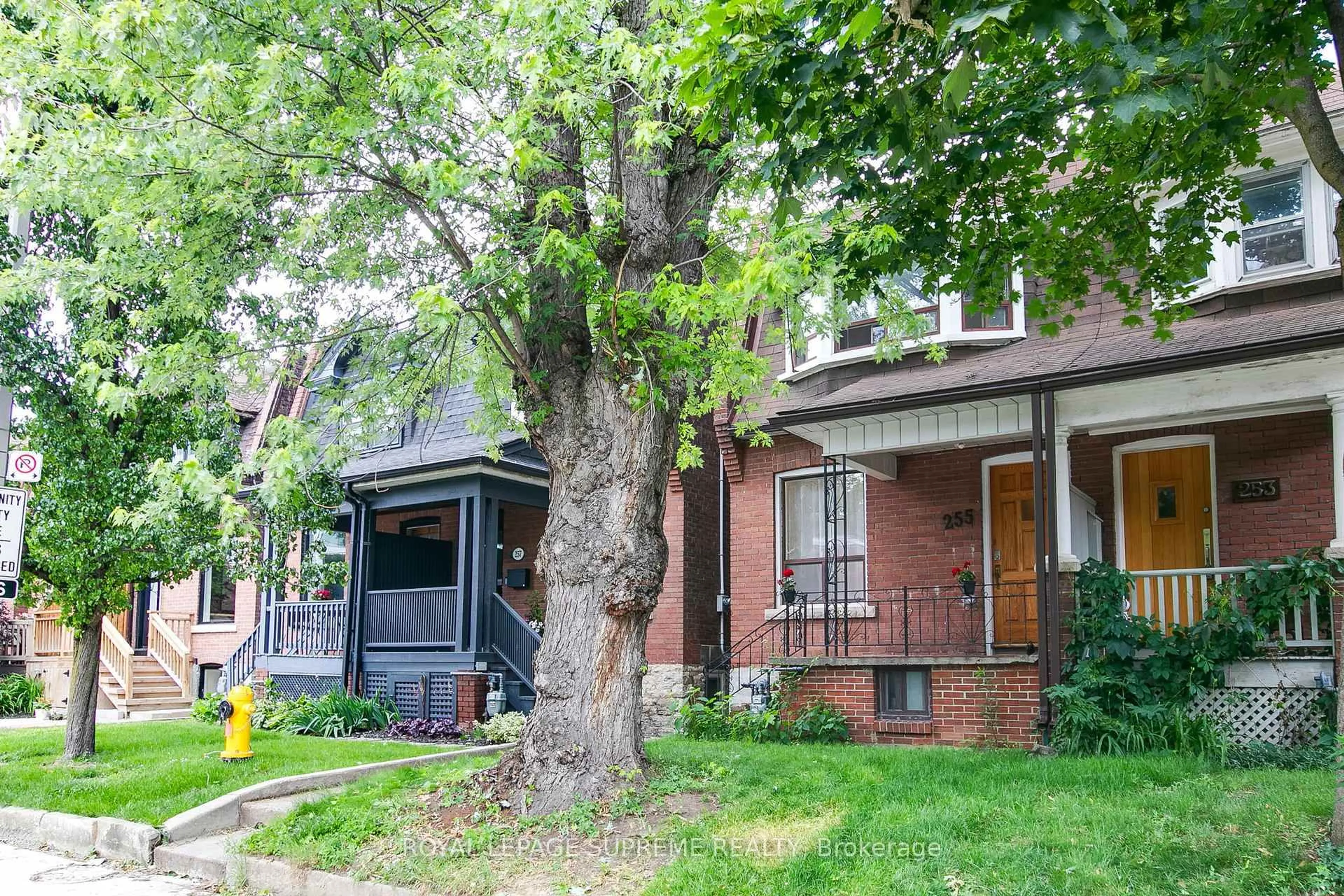Home with brick exterior material, street for 255 Howland Ave, Toronto Ontario M5R 3B7