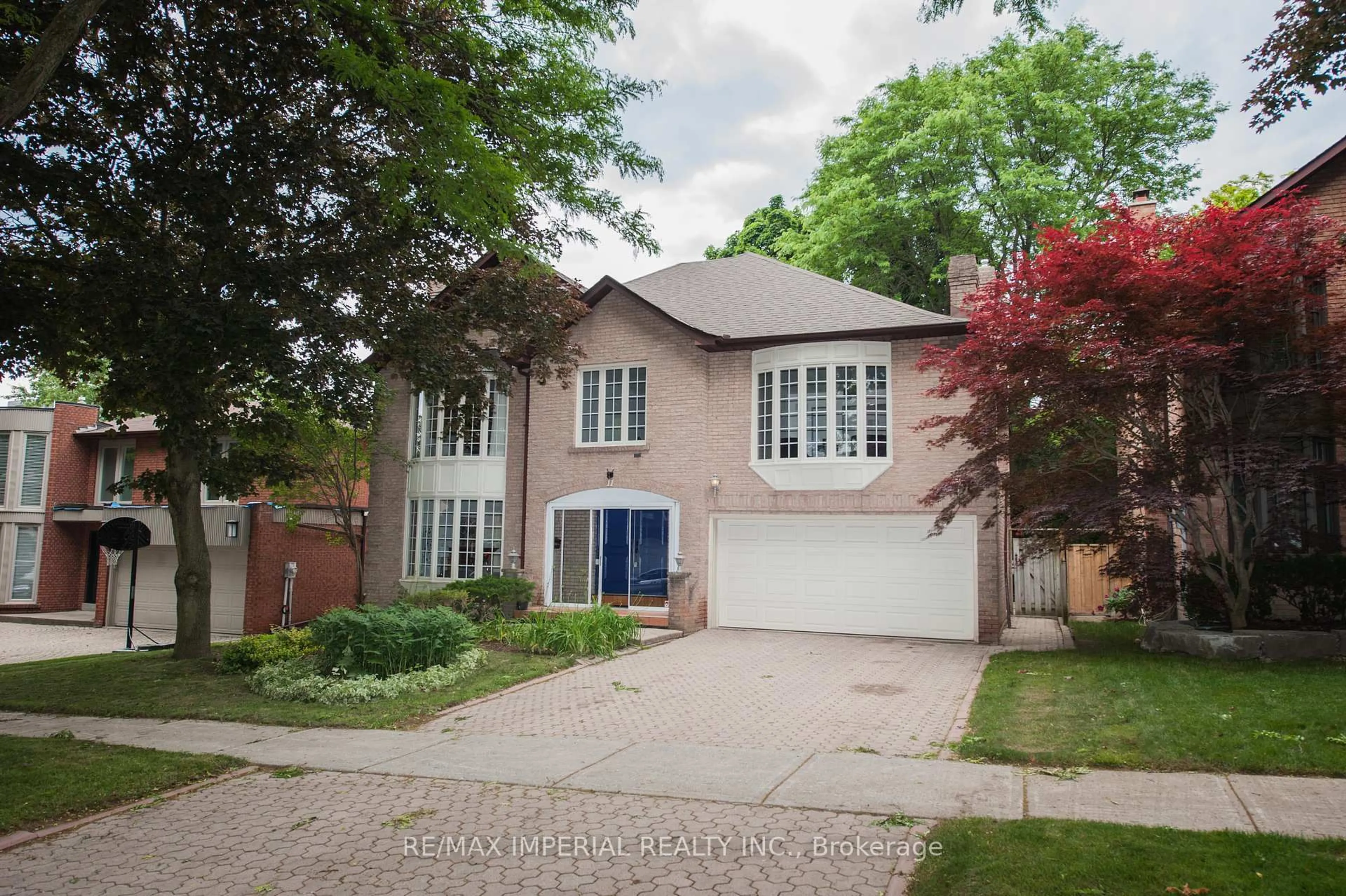 Home with brick exterior material, street for 11 Riderwood Dr, Toronto Ontario M2L 2X4