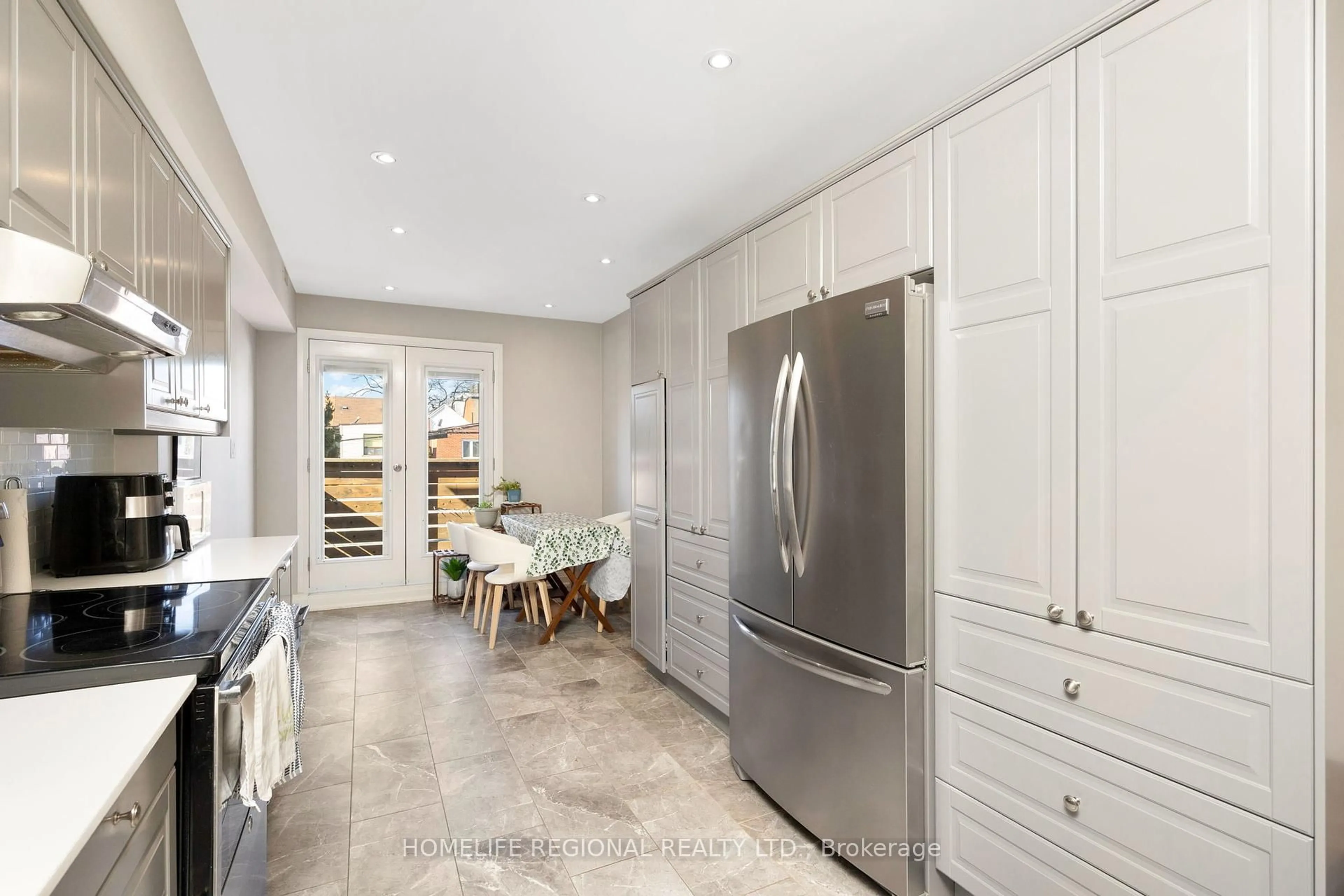 Open concept kitchen, ceramic/tile floor for 204 Roxton Rd, Toronto Ontario M6J 2Y5