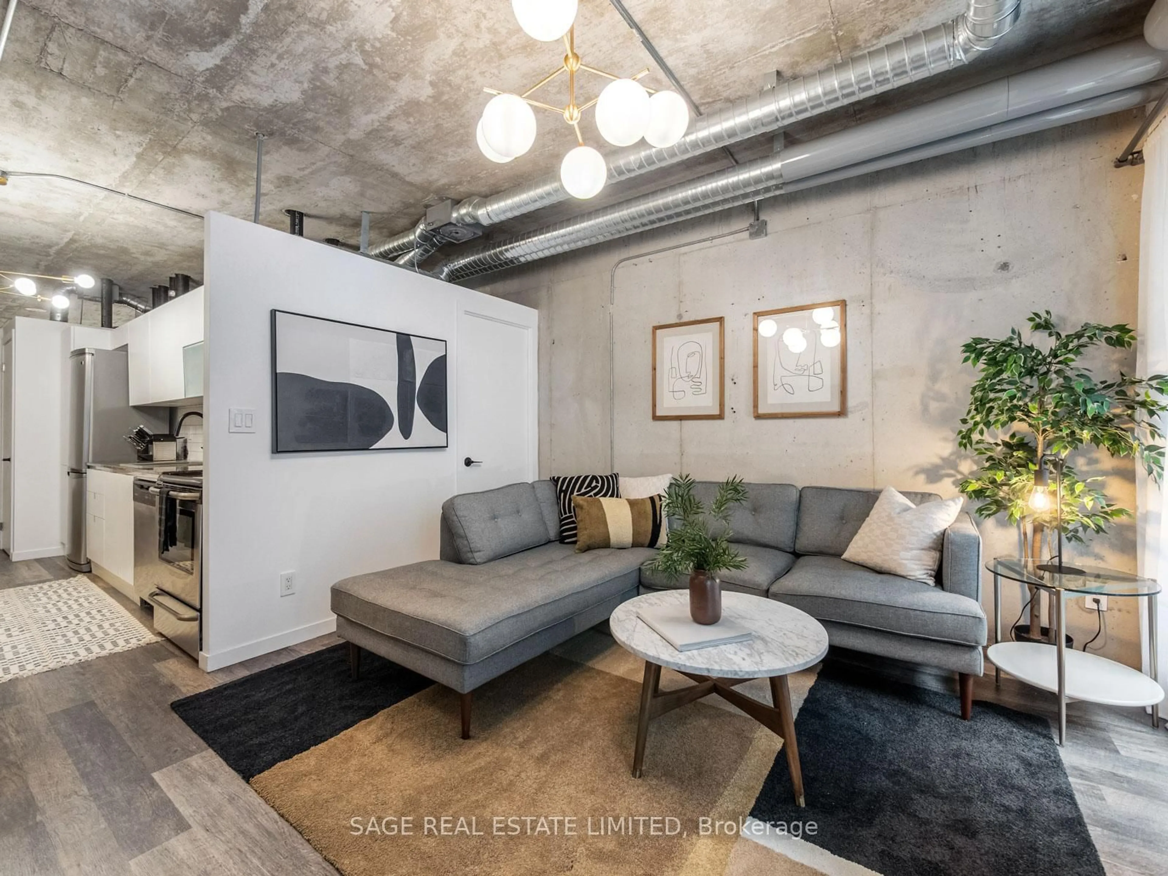 Living room with furniture, cement floor for 150 Sudbury St #1208, Toronto Ontario M6J 3S8