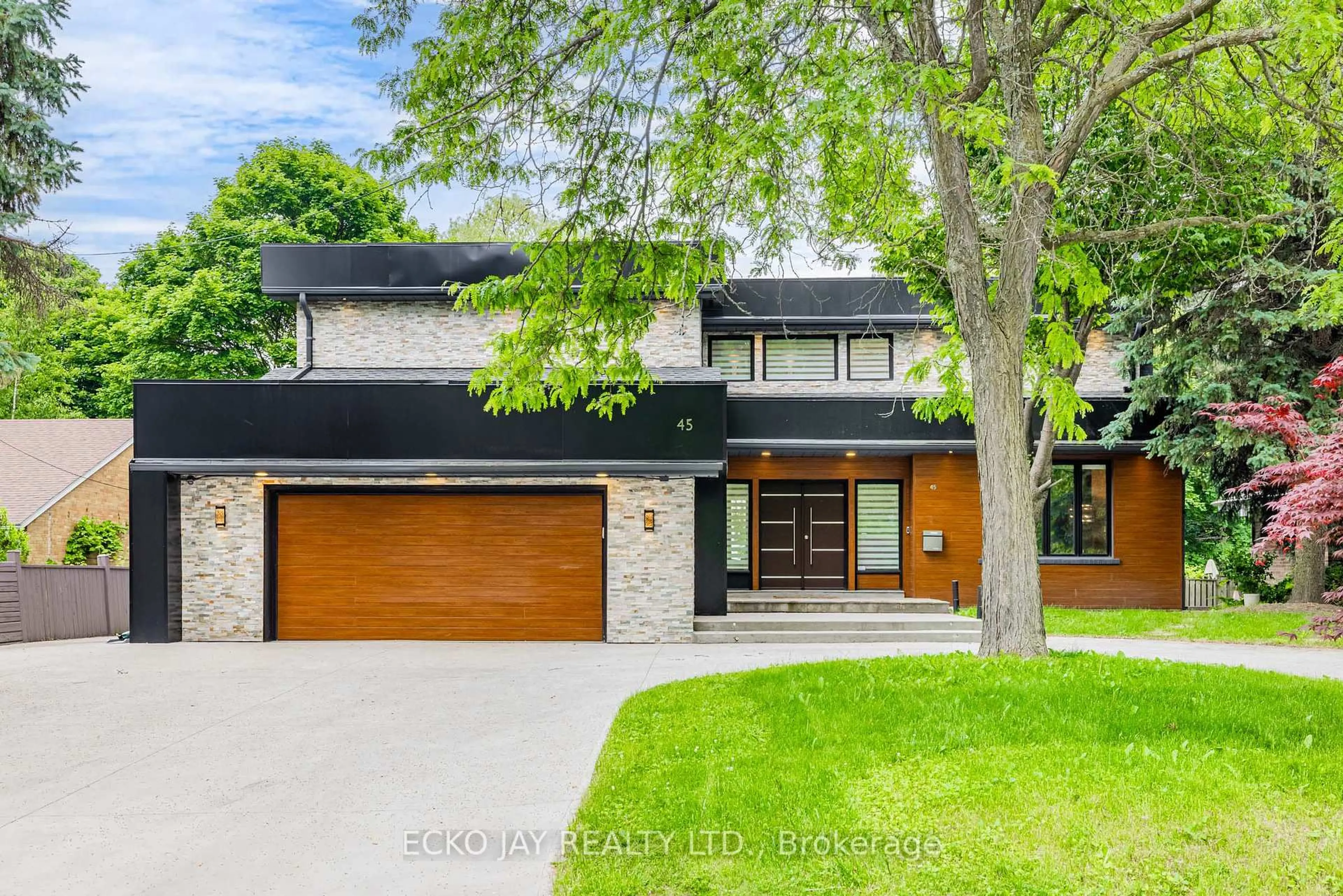 Home with brick exterior material, street for 45 Broadleaf Rd, Toronto Ontario M3B 1C3