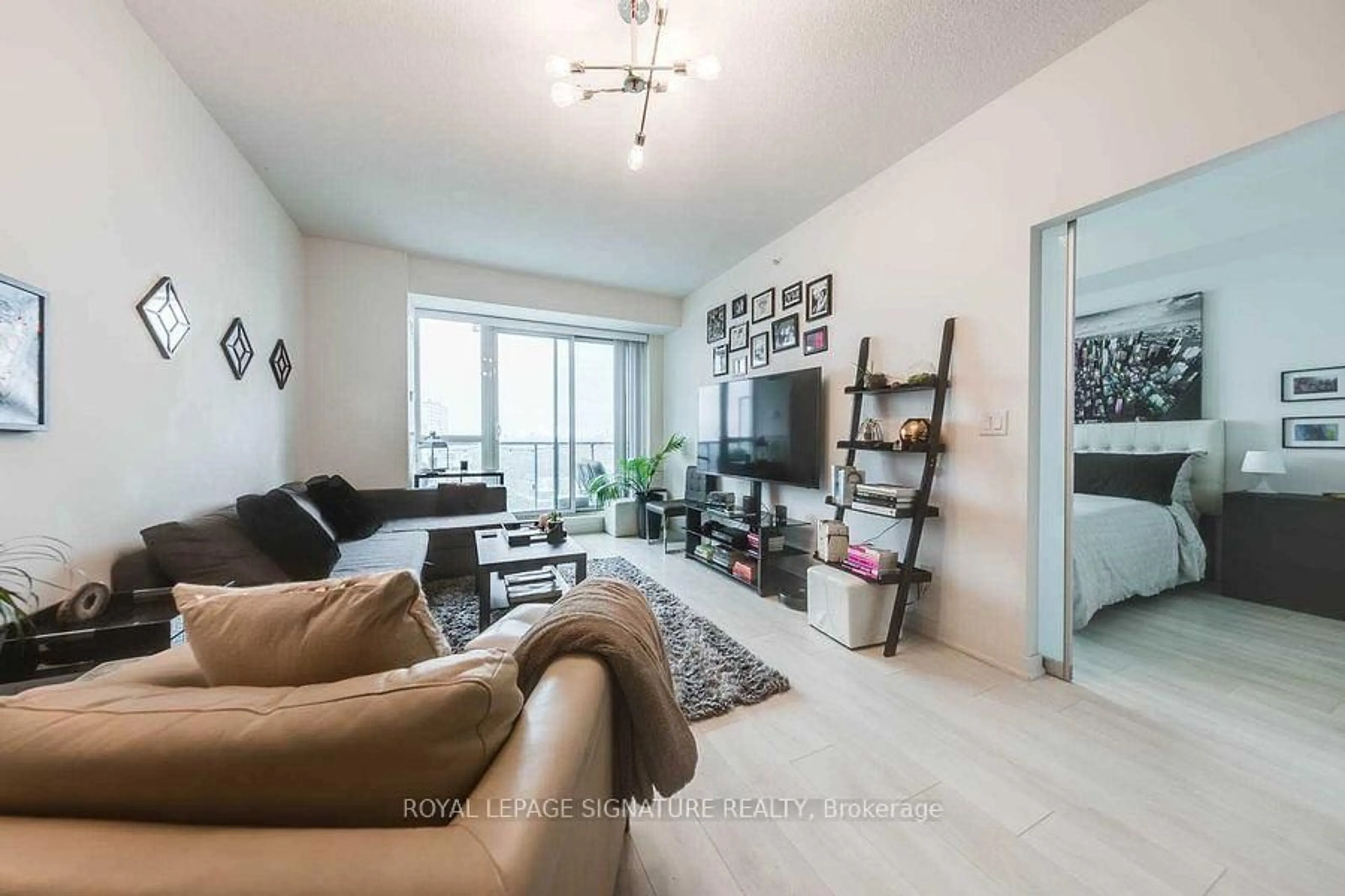 Living room with furniture, wood/laminate floor for 150 East Liberty St #2912, Toronto Ontario M6K 3R5
