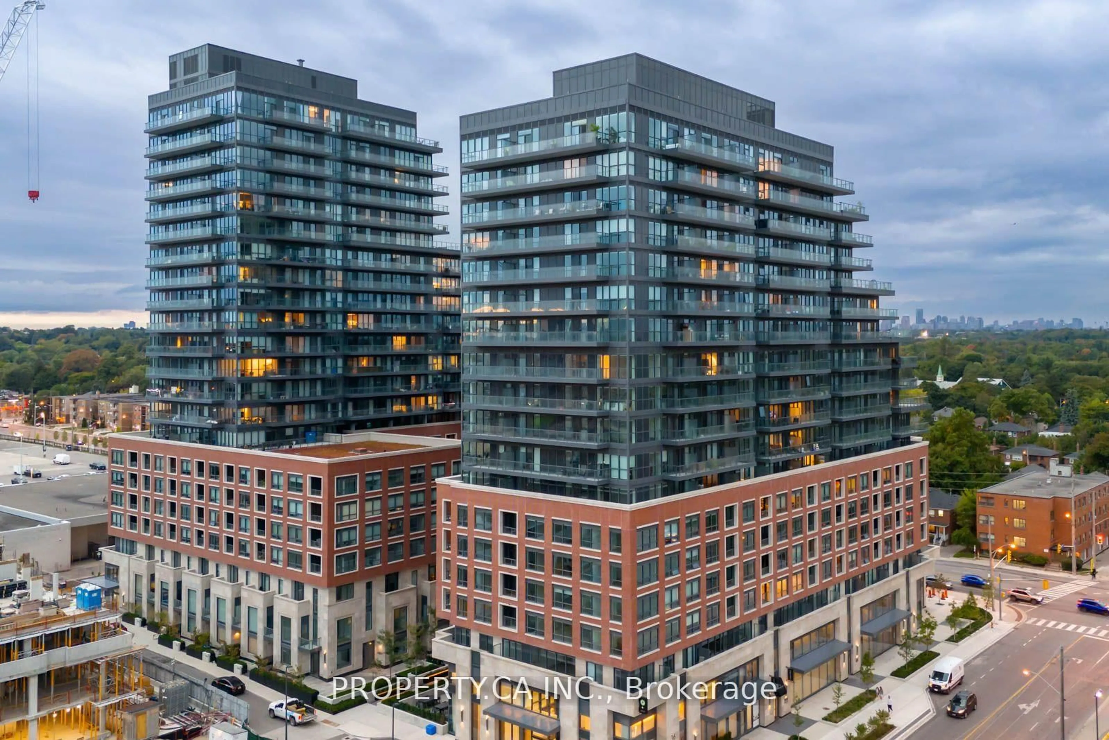 A pic from outside/outdoor area/front of a property/back of a property/a pic from drone, city buildings view from balcony for 33 Frederick Todd Way #303, Toronto Ontario M4G 0C9