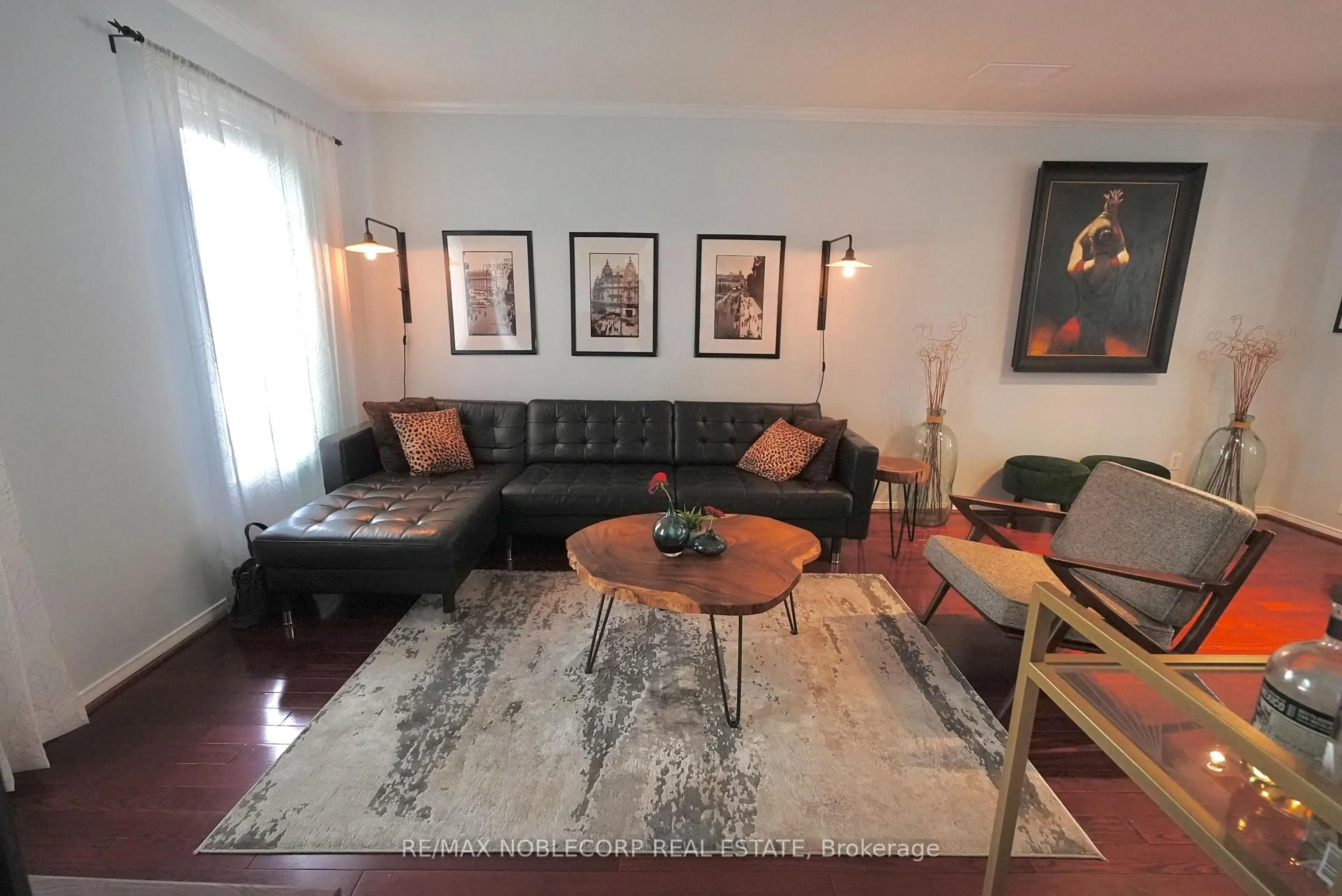 Living room with furniture, wood/laminate floor for 17 Overlea Blvd, Toronto Ontario M4H 1R4
