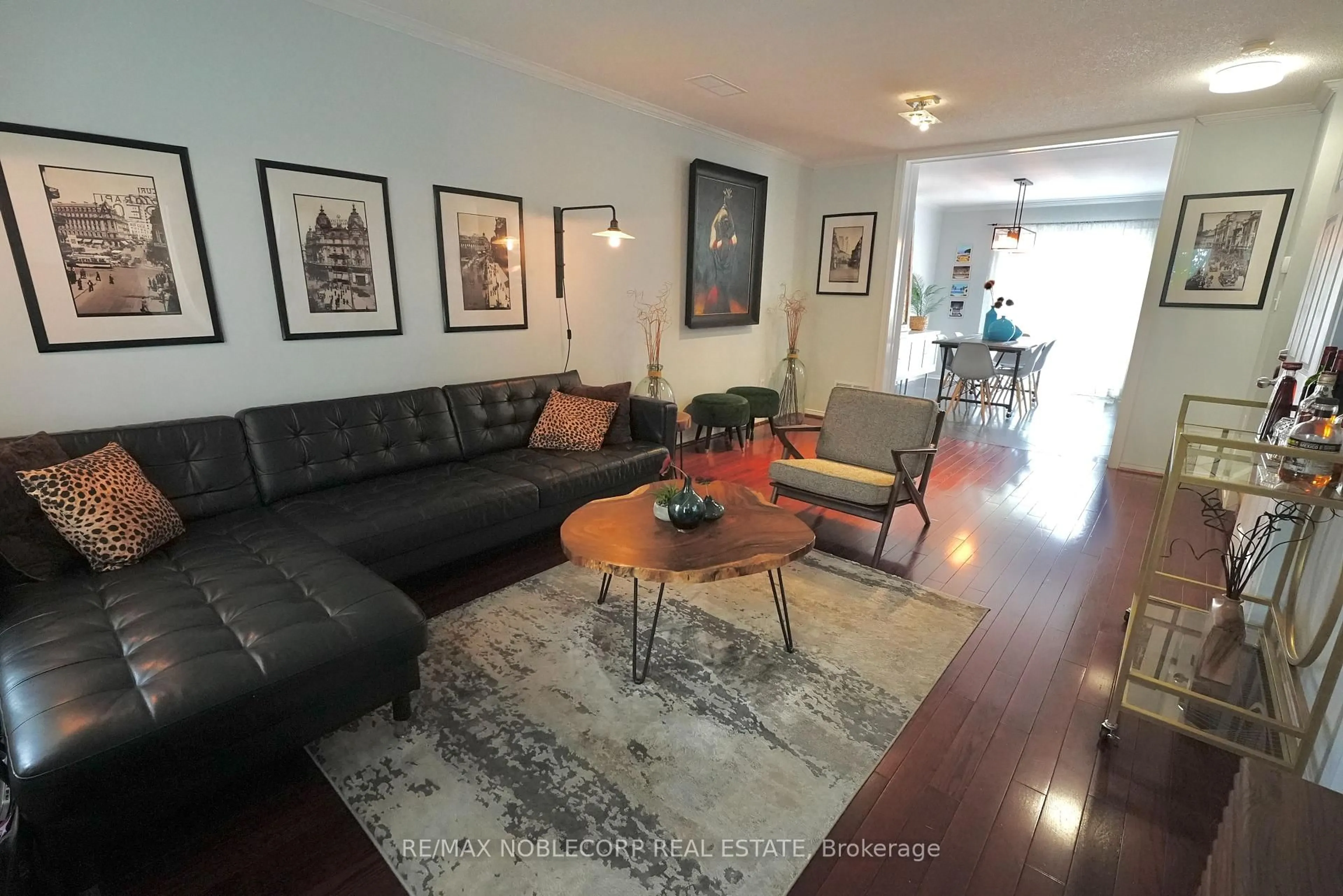 Living room with furniture, wood/laminate floor for 17 Overlea Blvd, Toronto Ontario M4H 1R4