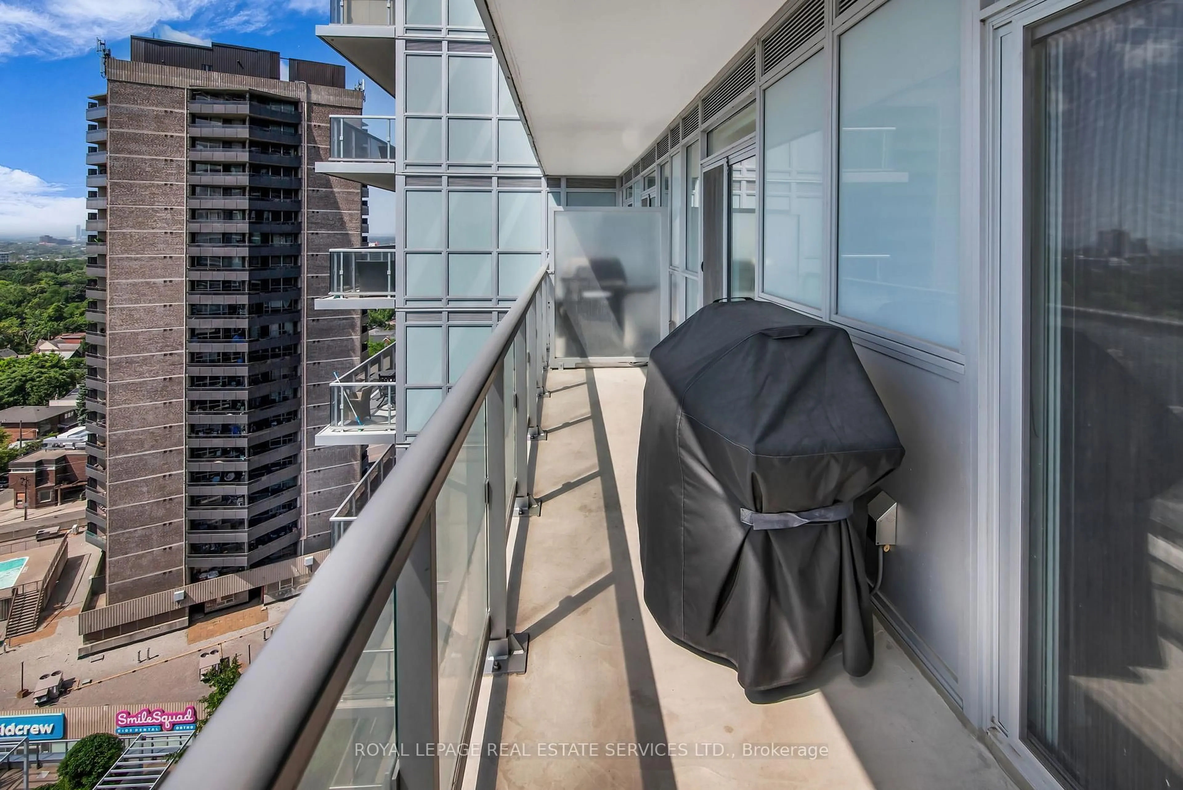 Balcony in the apartment, city buildings view from balcony for 501 St Clair Ave #1405, Toronto Ontario M5P 0A2