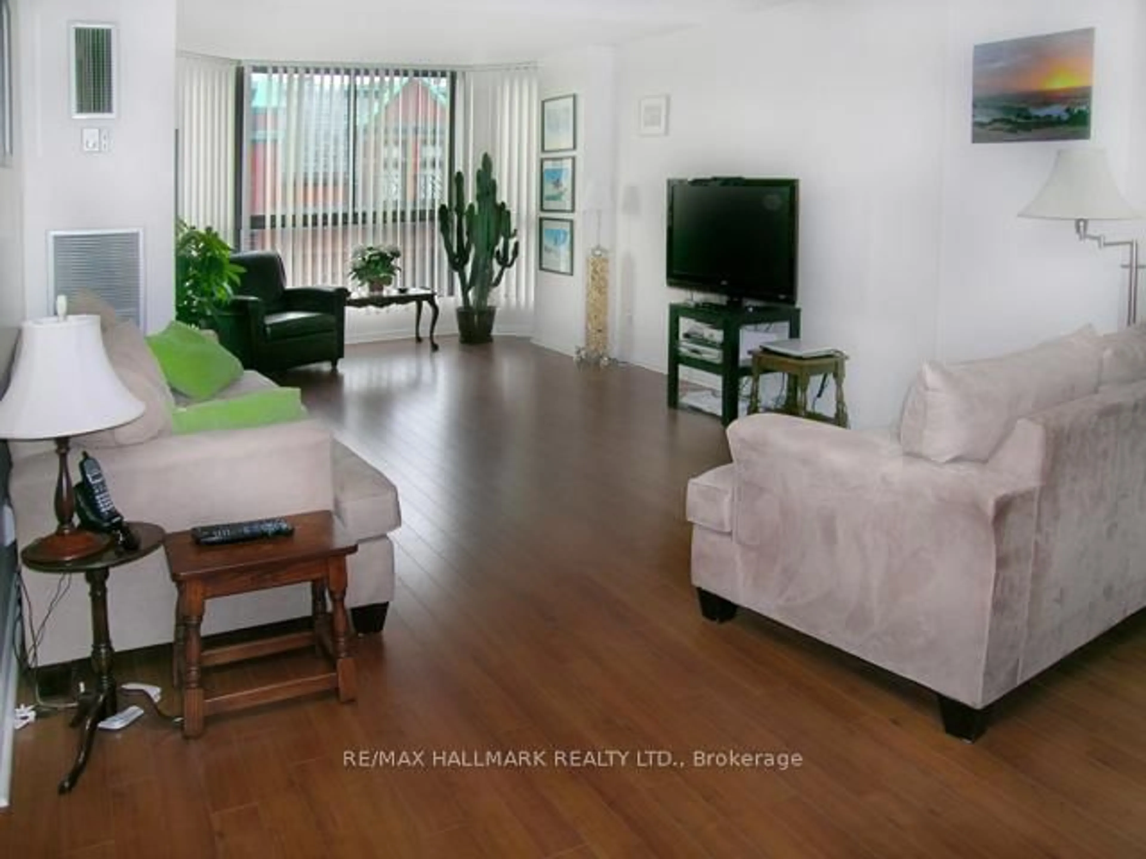 Living room with furniture, wood/laminate floor for 30 Church St #801, Toronto Ontario M5E 1S7