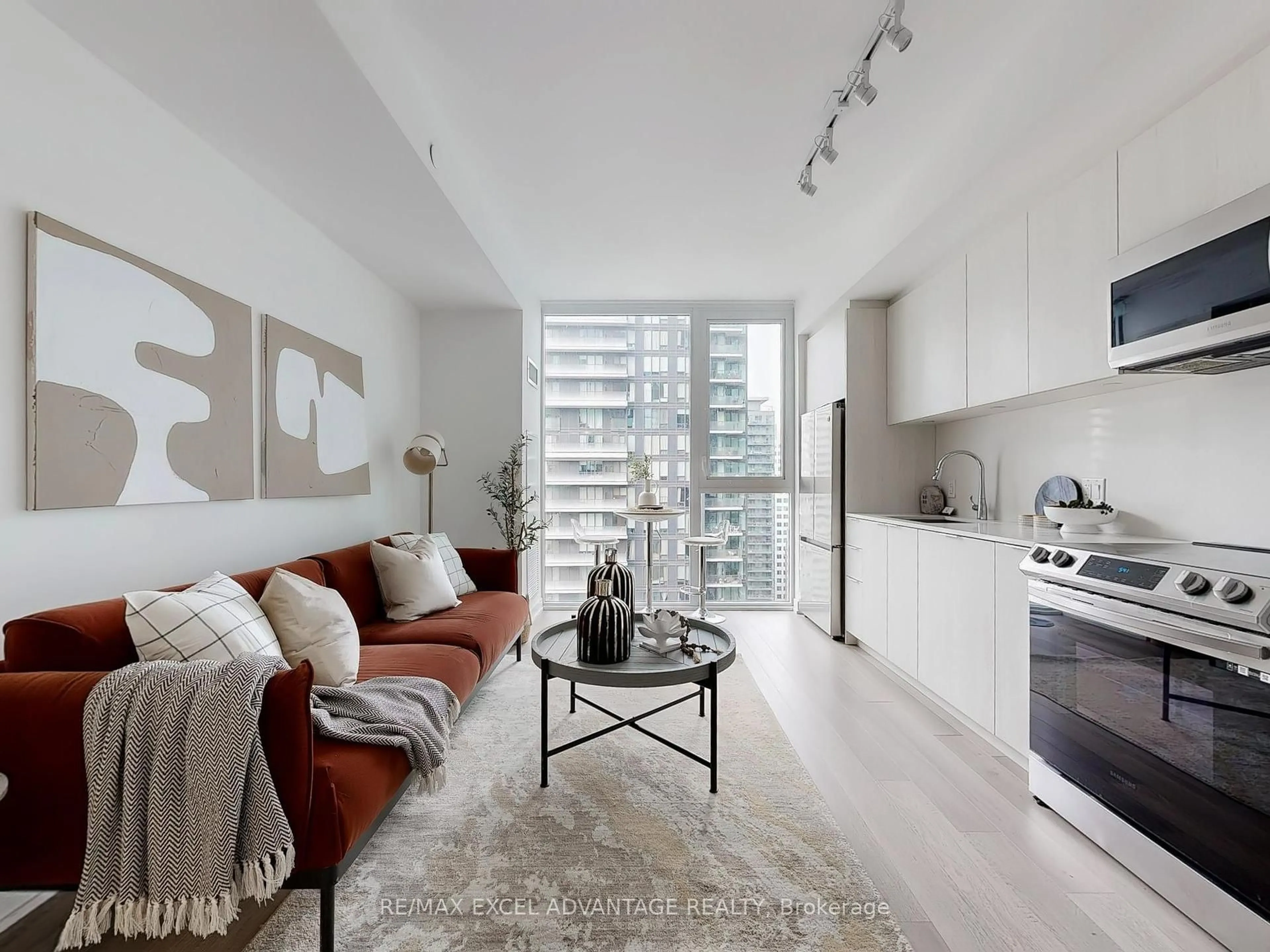Living room with furniture, unknown for 357 King St #2405, Toronto Ontario M5V 0S7