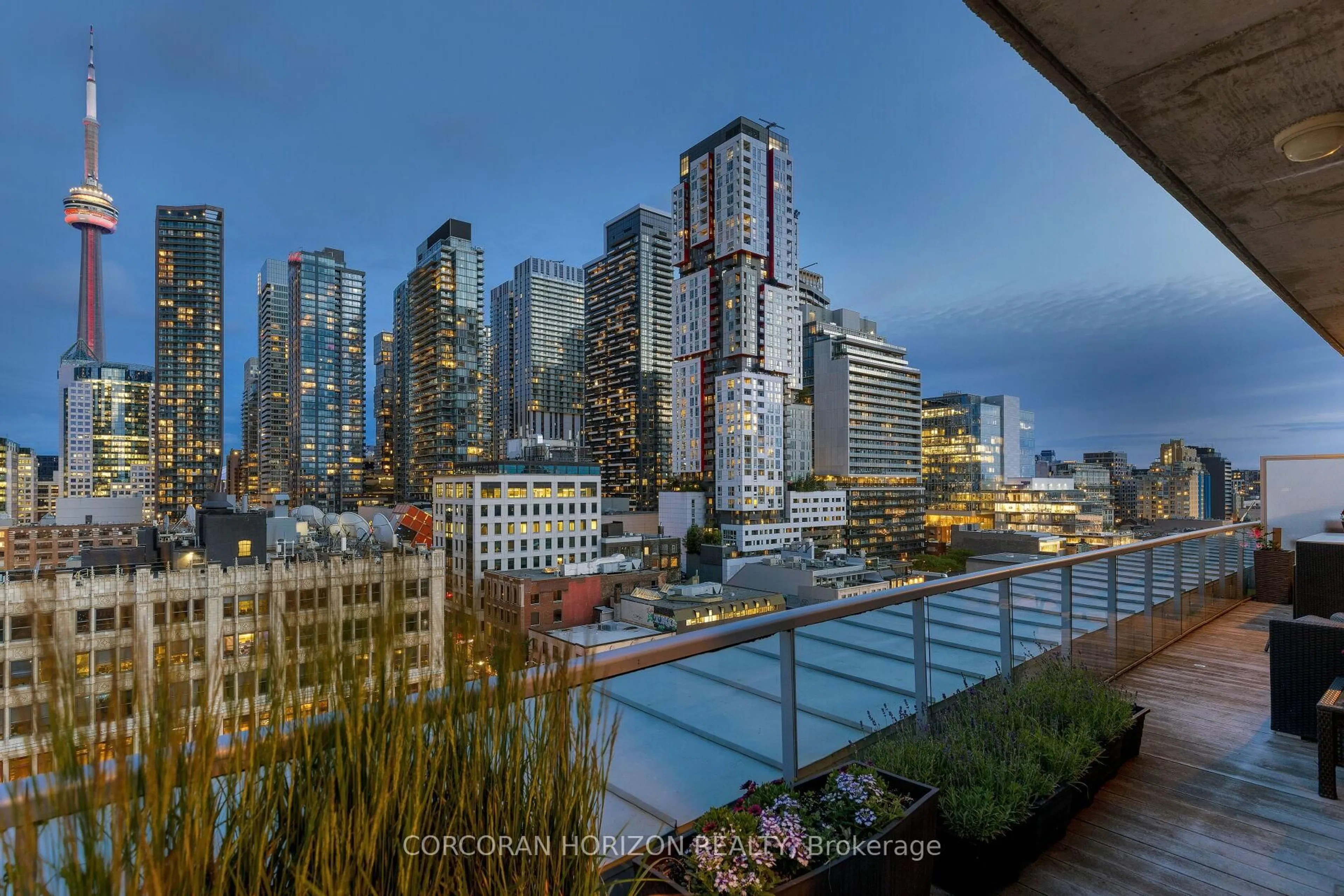 Patio, city buildings view from balcony for 169 John St #PH4, Toronto Ontario M5T 1X3