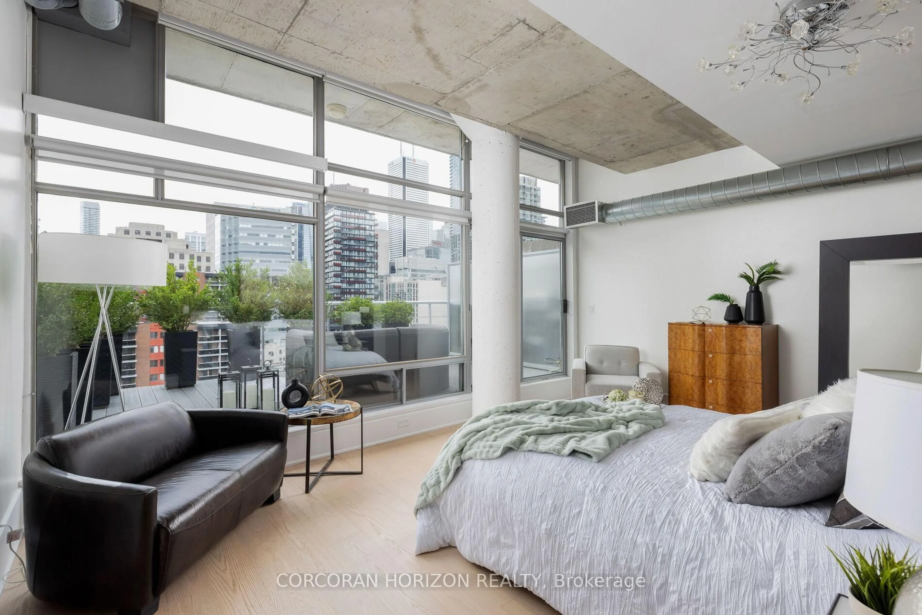 Bedroom with bed, cement floor for 169 John St #PH4, Toronto Ontario M5T 1X3