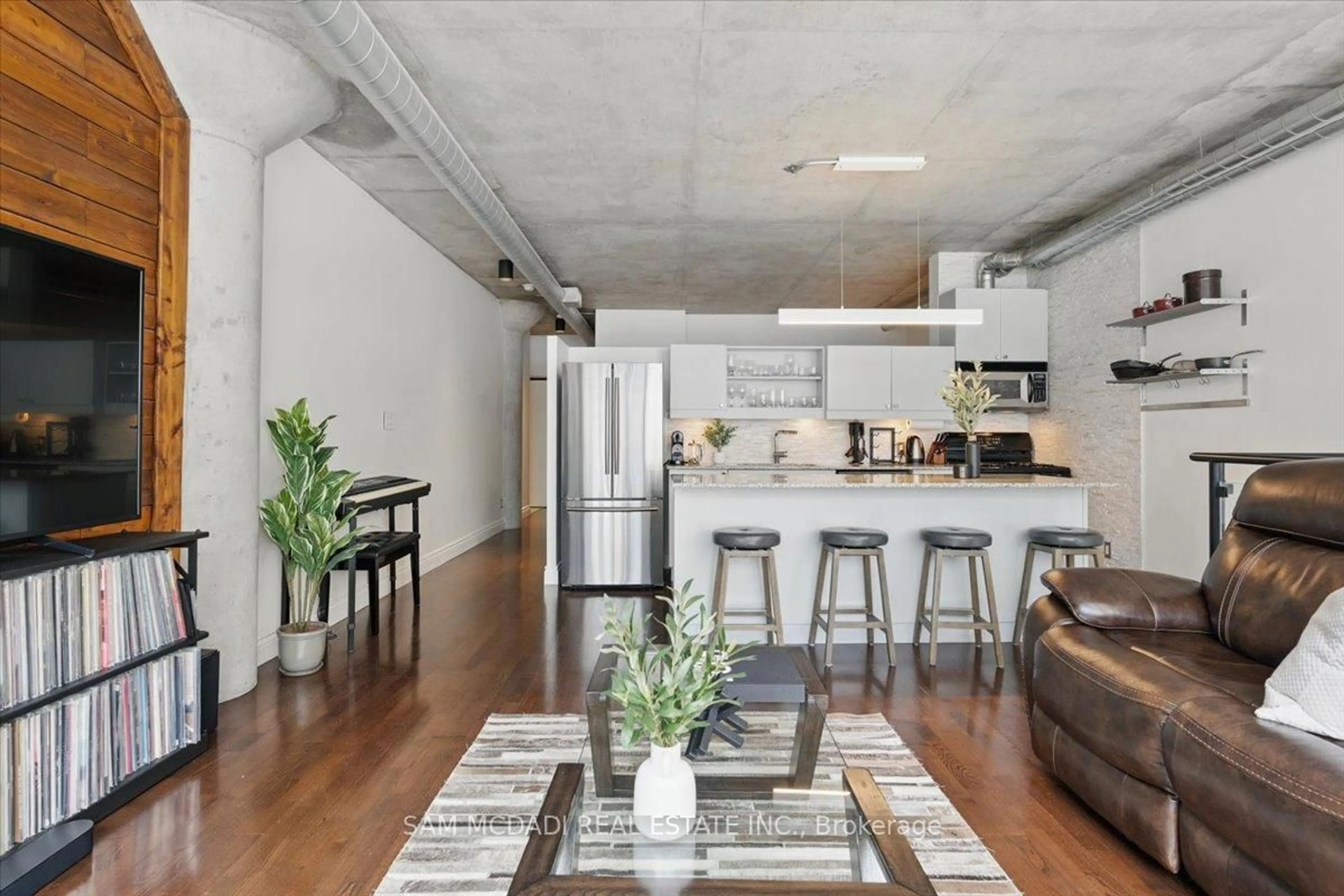 Open concept kitchen, cement floor for 42 Camden St #204, Toronto Ontario M5V 1V1