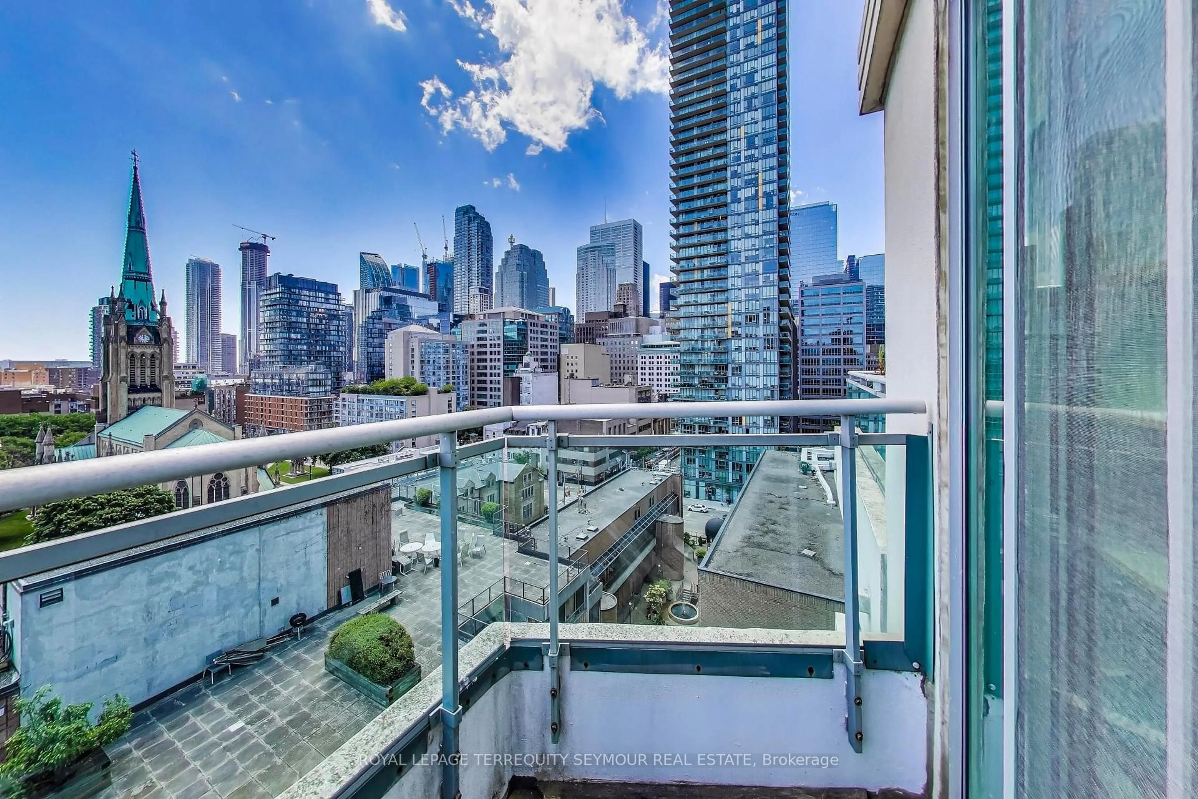 Balcony in the apartment, city buildings view from balcony for 77 Lombard St #PH3, Toronto Ontario M5C 3E1