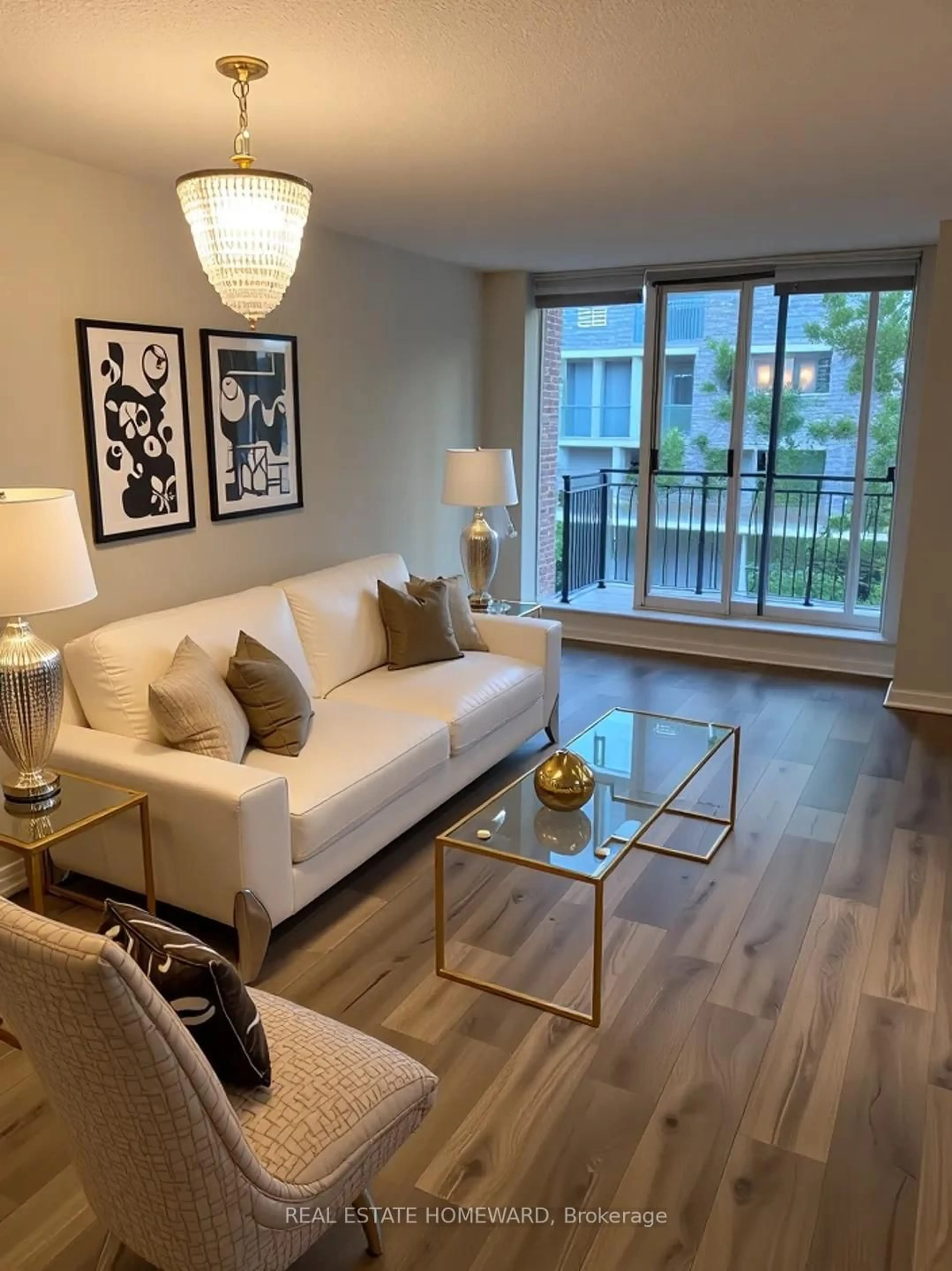Living room with furniture, wood/laminate floor for 188 Redpath Ave #405, Toronto Ontario M4P 3J2