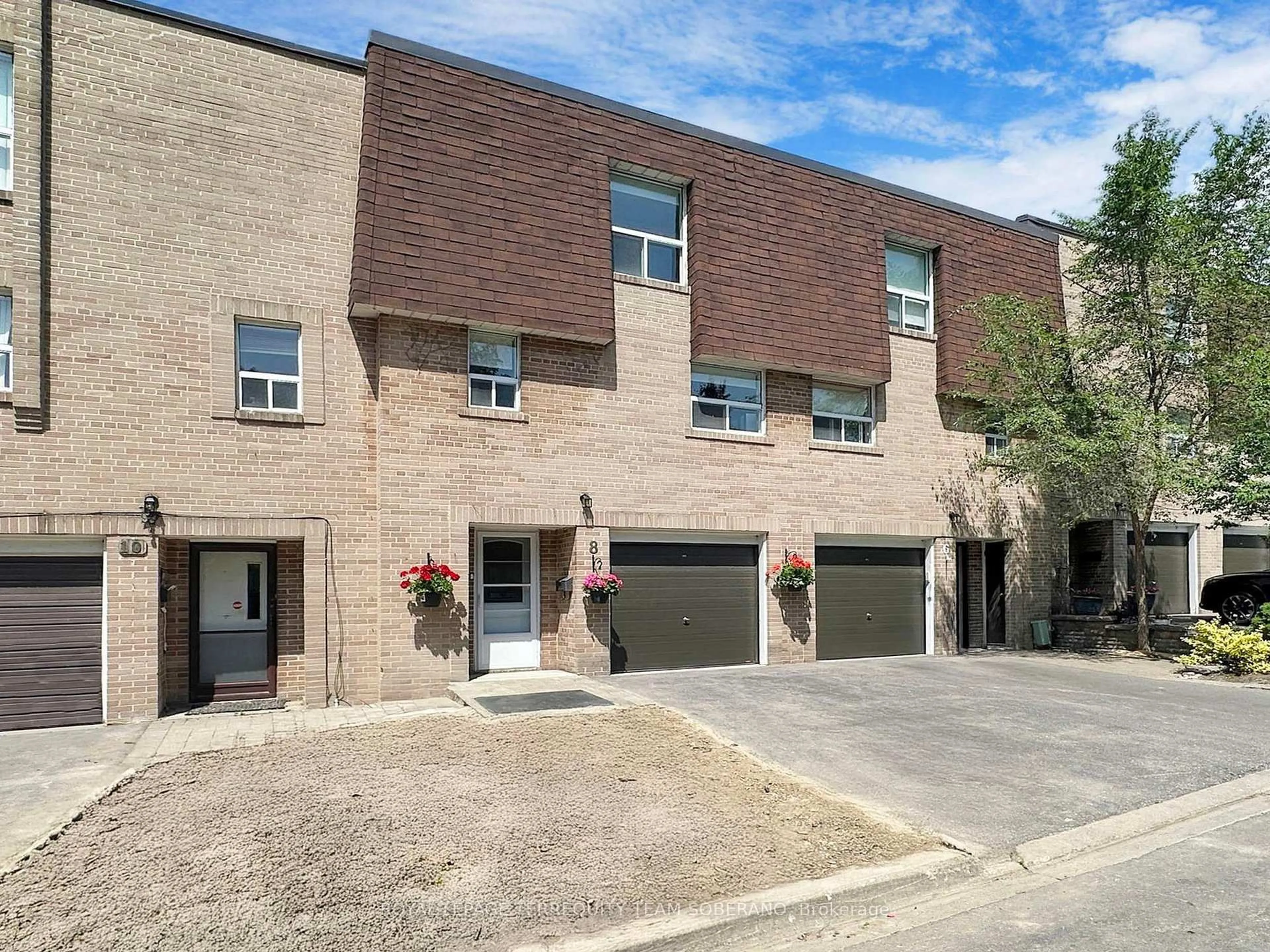 Home with brick exterior material, street for 8 Village Greenway, Toronto Ontario M2J 1K8