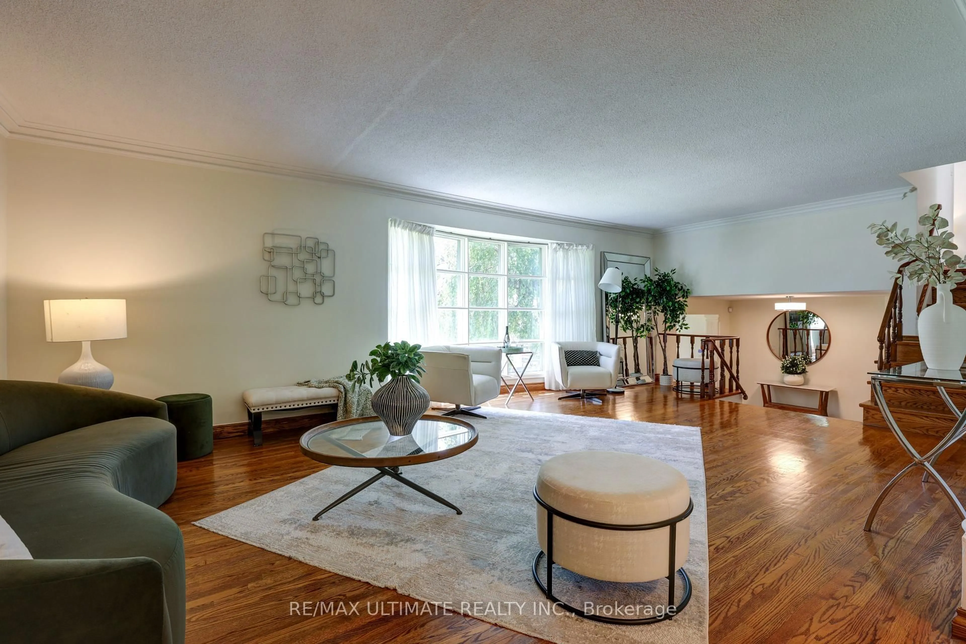 Living room with furniture, unknown for 206 Sloane Ave, Toronto Ontario M4A 2C6