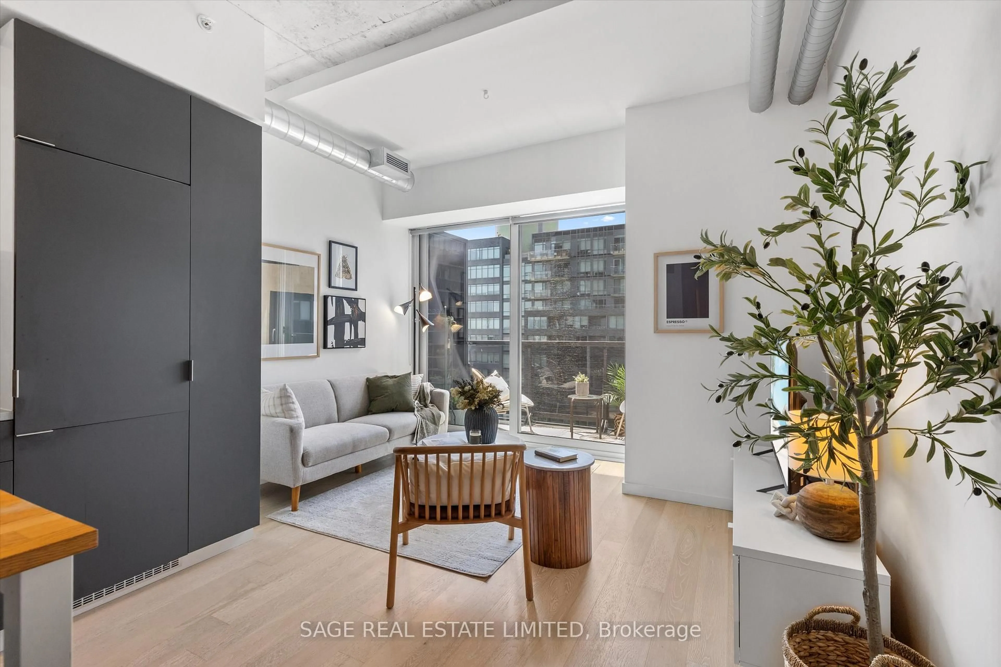 Living room with furniture, unknown for 170 Bayview Ave #707, Toronto Ontario M5A 0M4