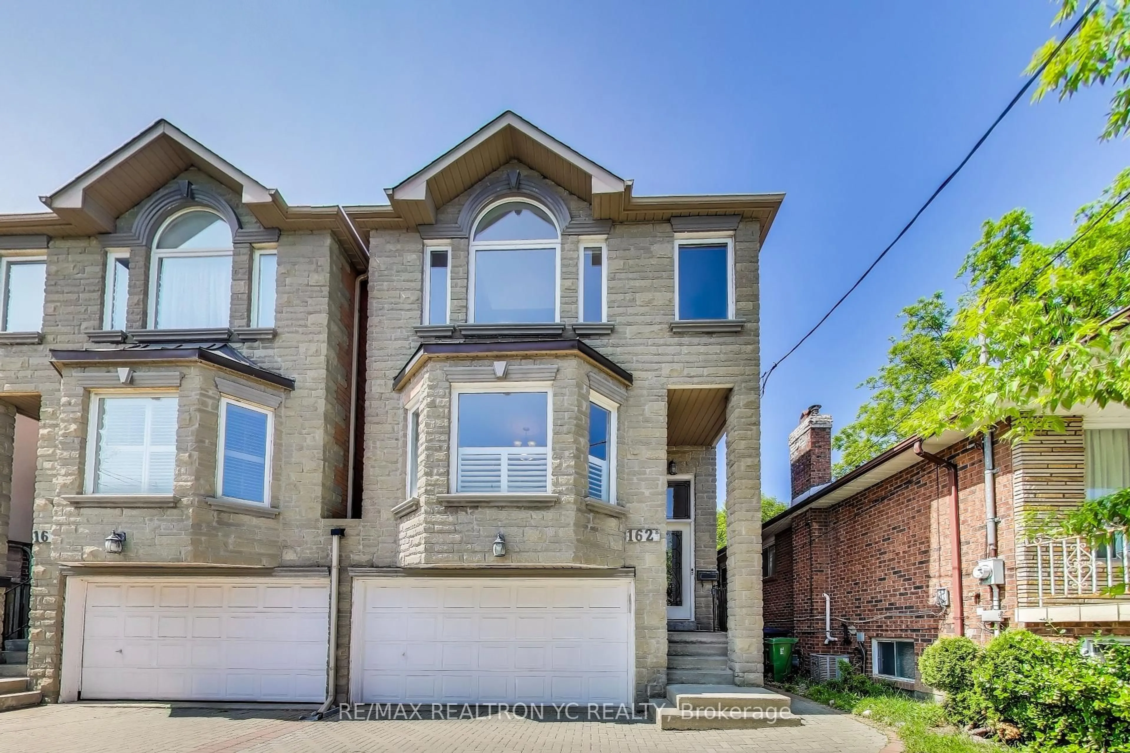 Home with brick exterior material, street for 162B Finch Ave, Toronto Ontario M2N 4R9