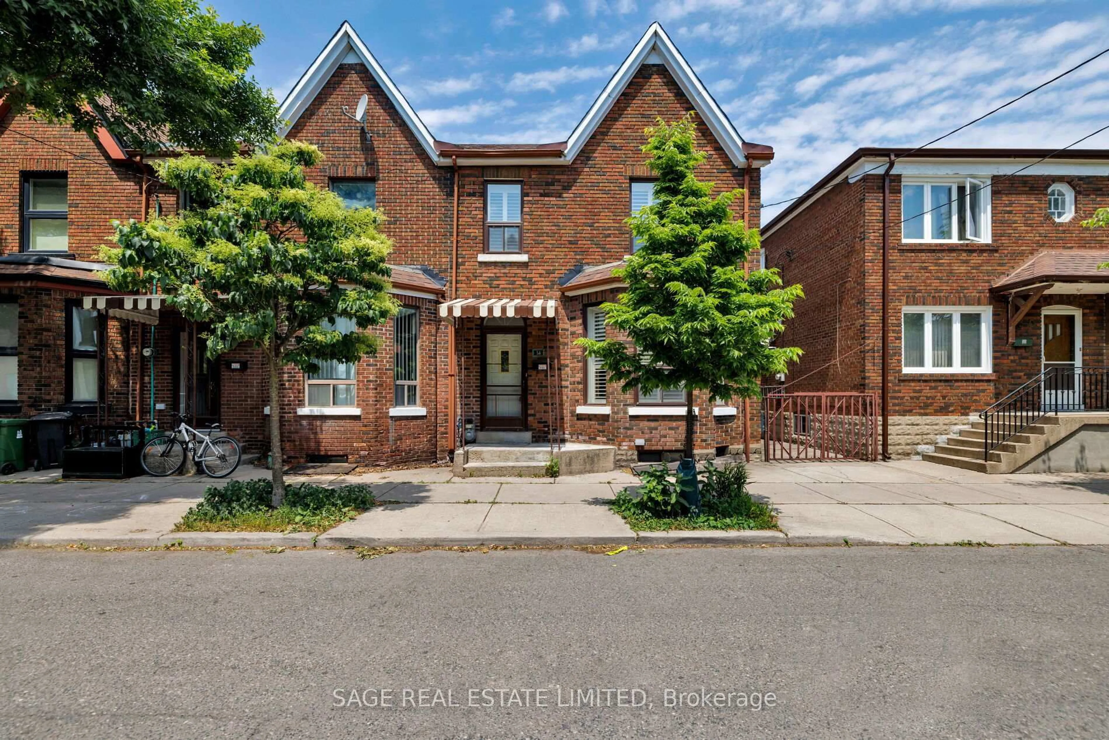 Home with brick exterior material, street for 34 Henderson Ave, Toronto Ontario M6J 2B8