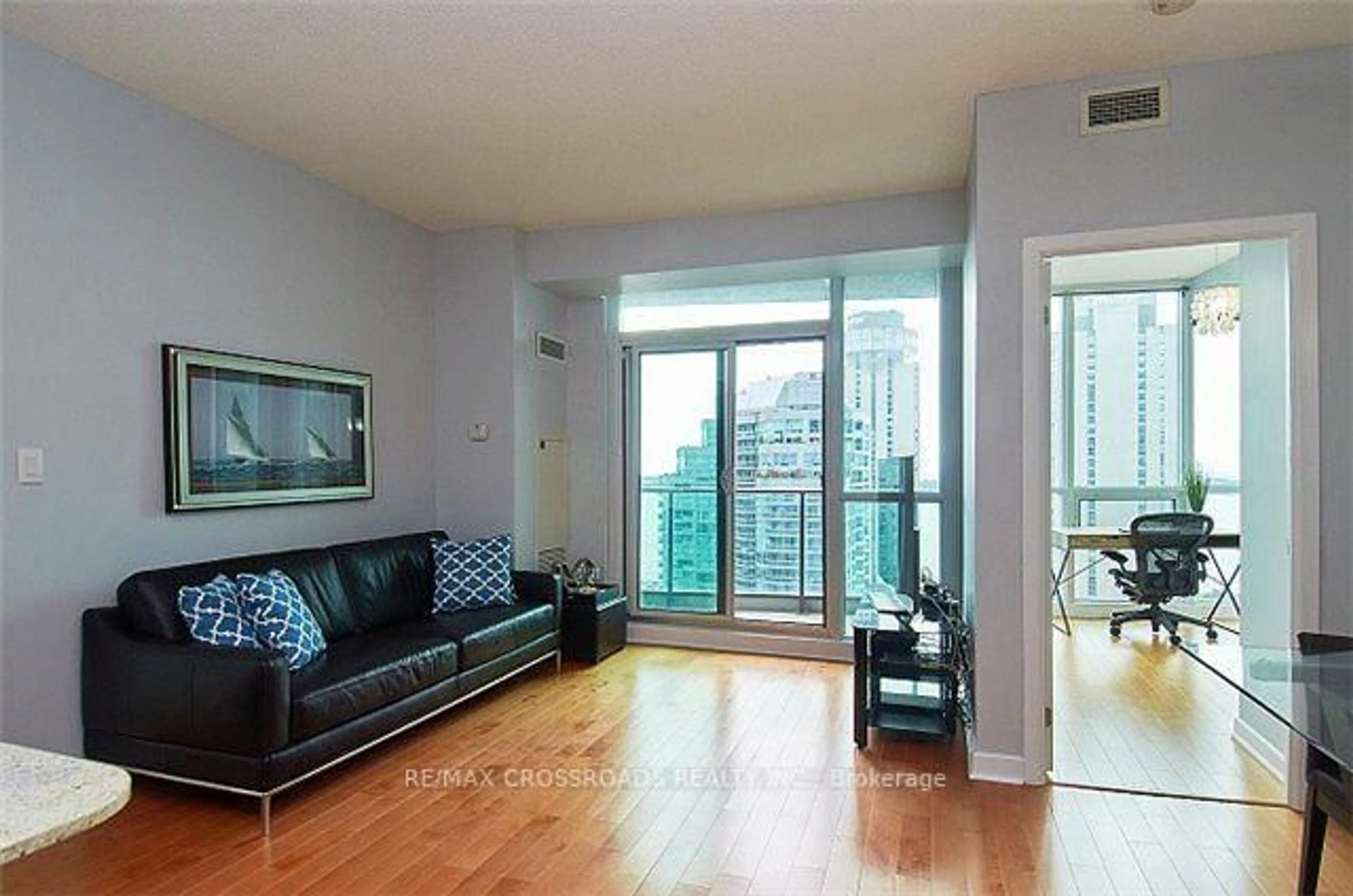 Living room with furniture, wood/laminate floor for 18 Harbour St #2209, Toronto Ontario M5J 2Z6