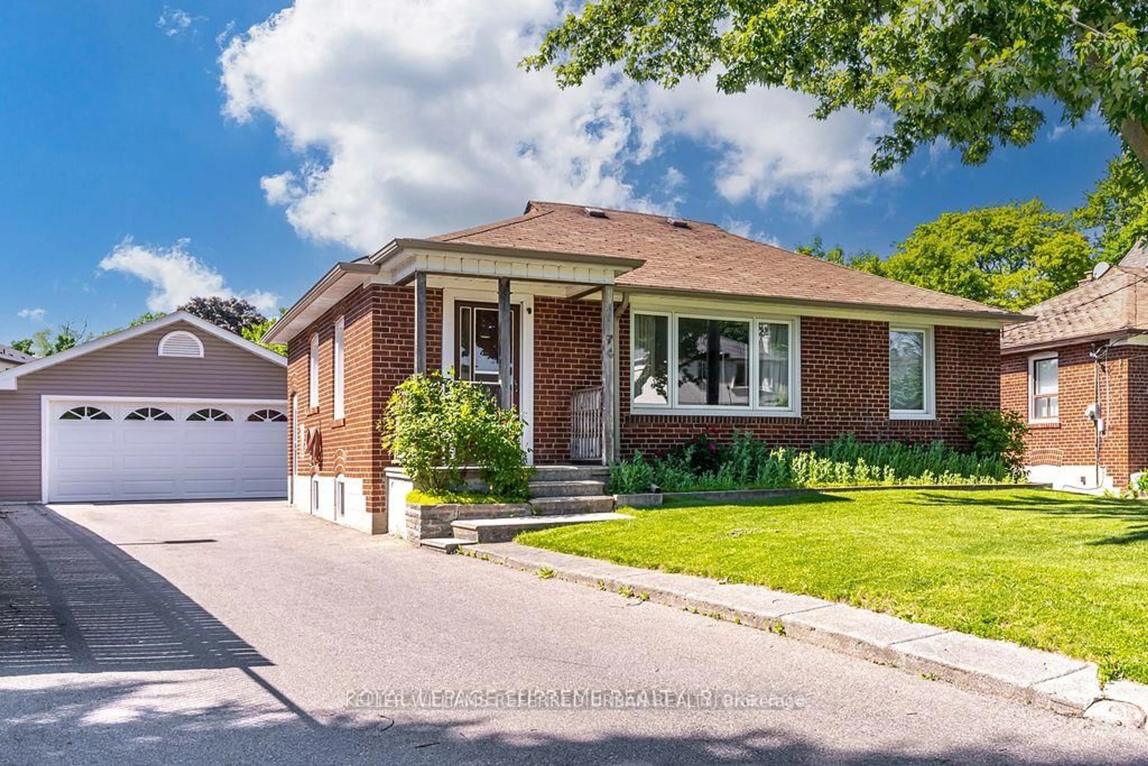 Home with brick exterior material, street for 74 Roberta Dr, Toronto Ontario M6A 2J7