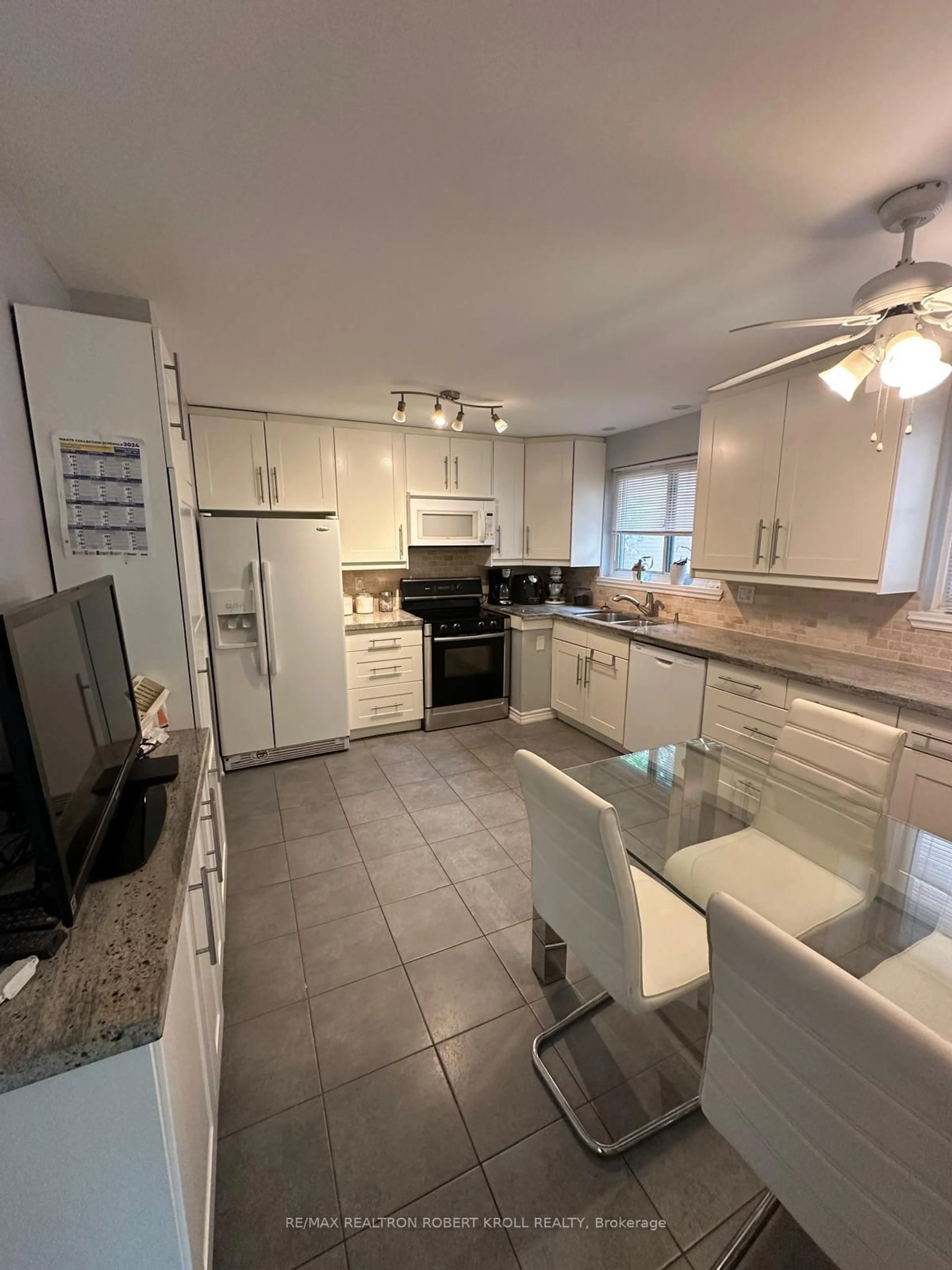Open concept kitchen, ceramic/tile floor for 92 Elise Terr, Toronto Ontario M2R 2X1