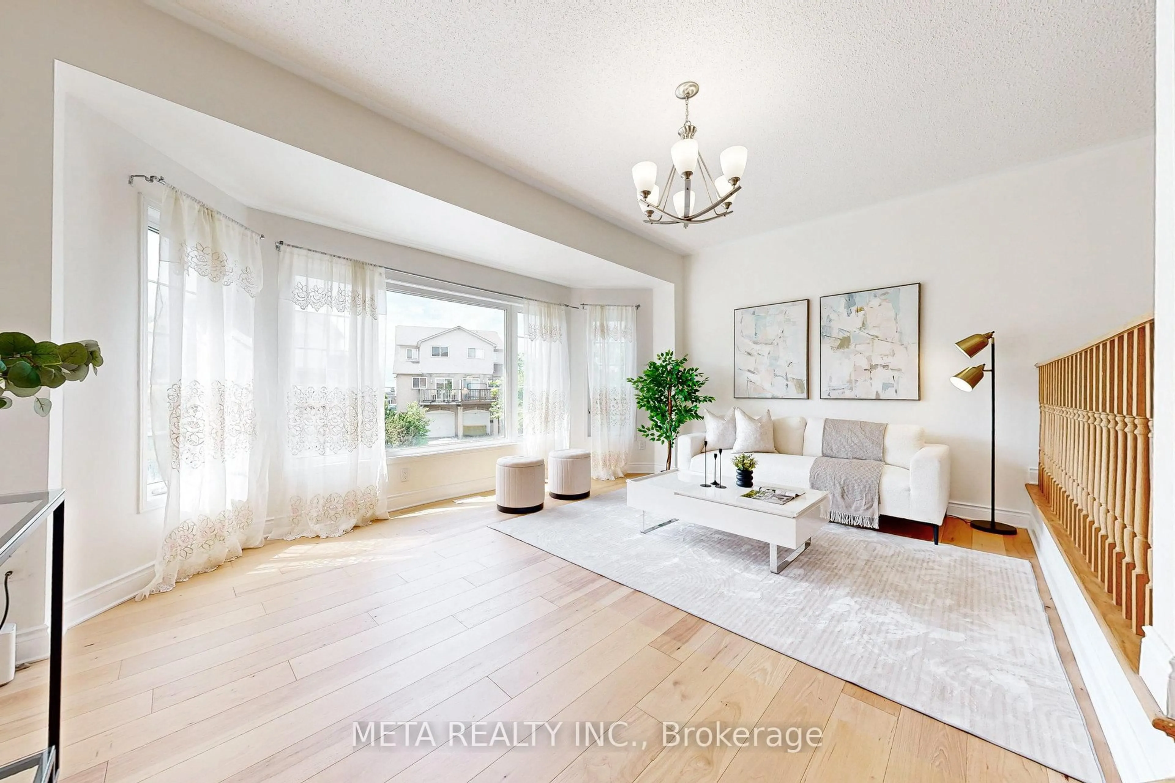 Living room with furniture, wood/laminate floor for 26 Rumi Cres, Toronto Ontario M4A 2X6