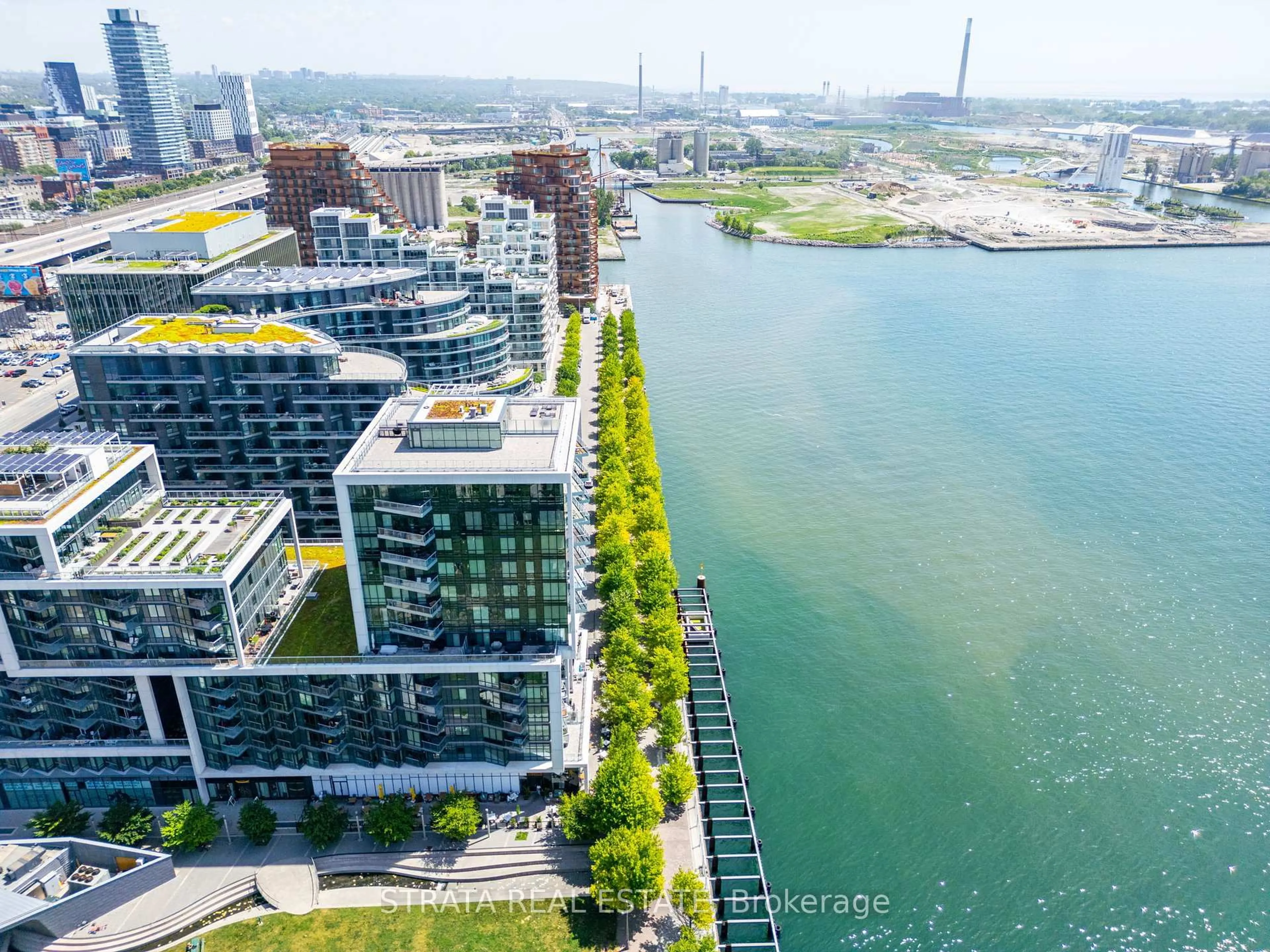 A pic from outside/outdoor area/front of a property/back of a property/a pic from drone, city buildings view from balcony for 55 Merchants' Wharf #415, Toronto Ontario M5A 0P2