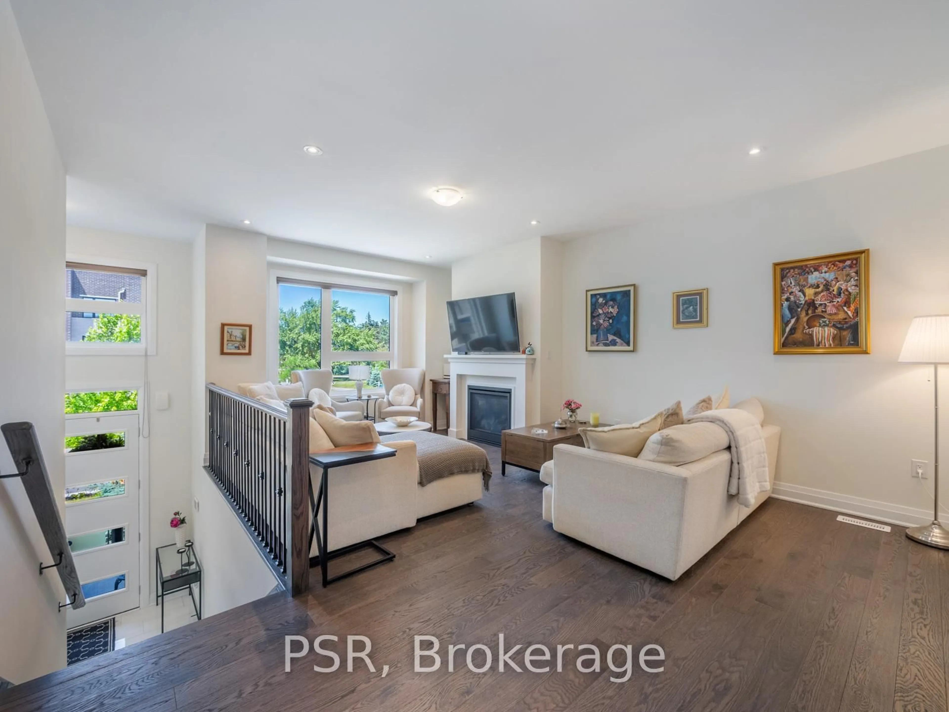 Living room with furniture, ceramic/tile floor for 23 Hollyhock Crt, Toronto Ontario M3B 0B4