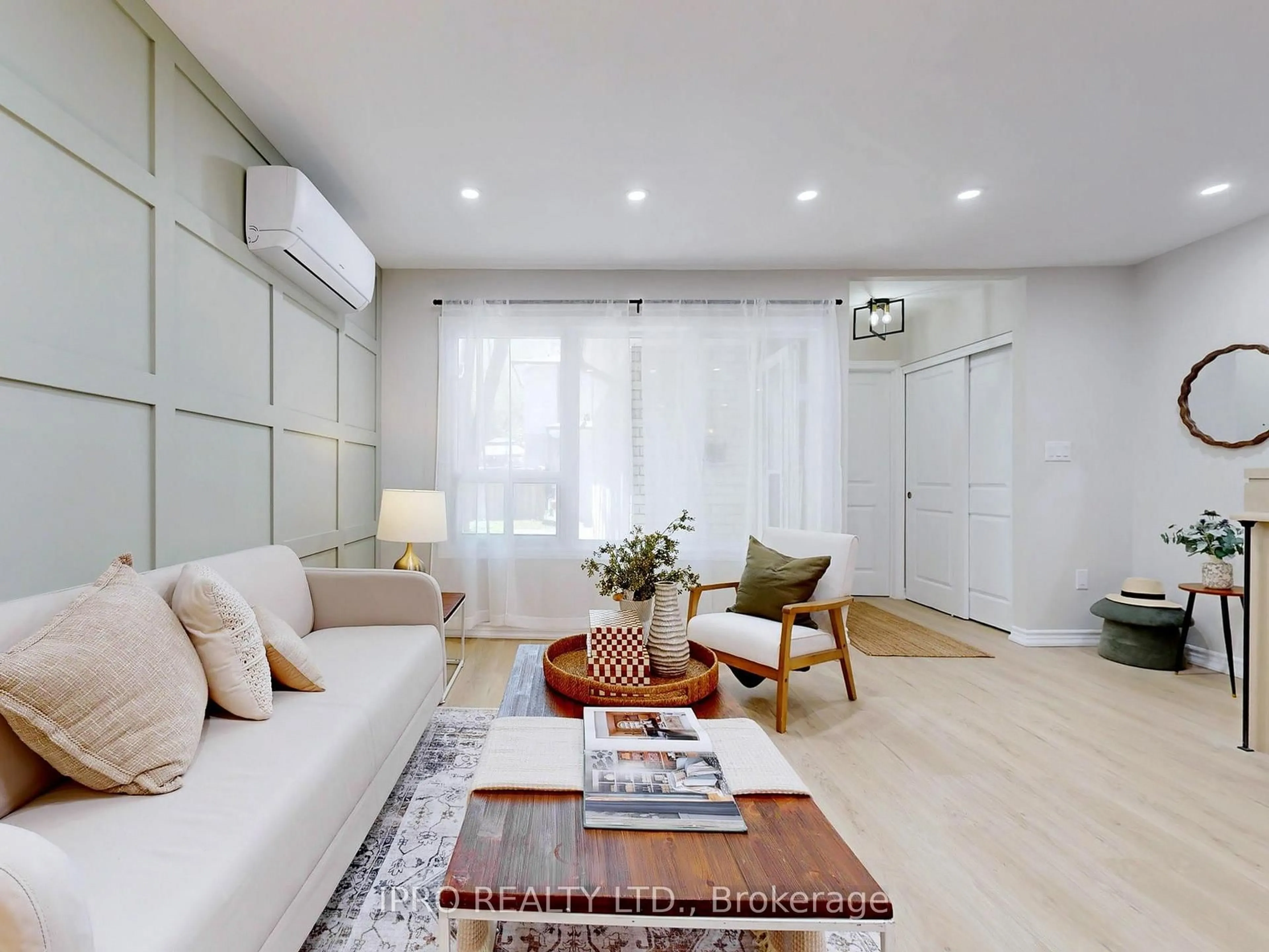 Living room with furniture, wood/laminate floor for 61 Plum Tree Way, Toronto Ontario M2R 3J1