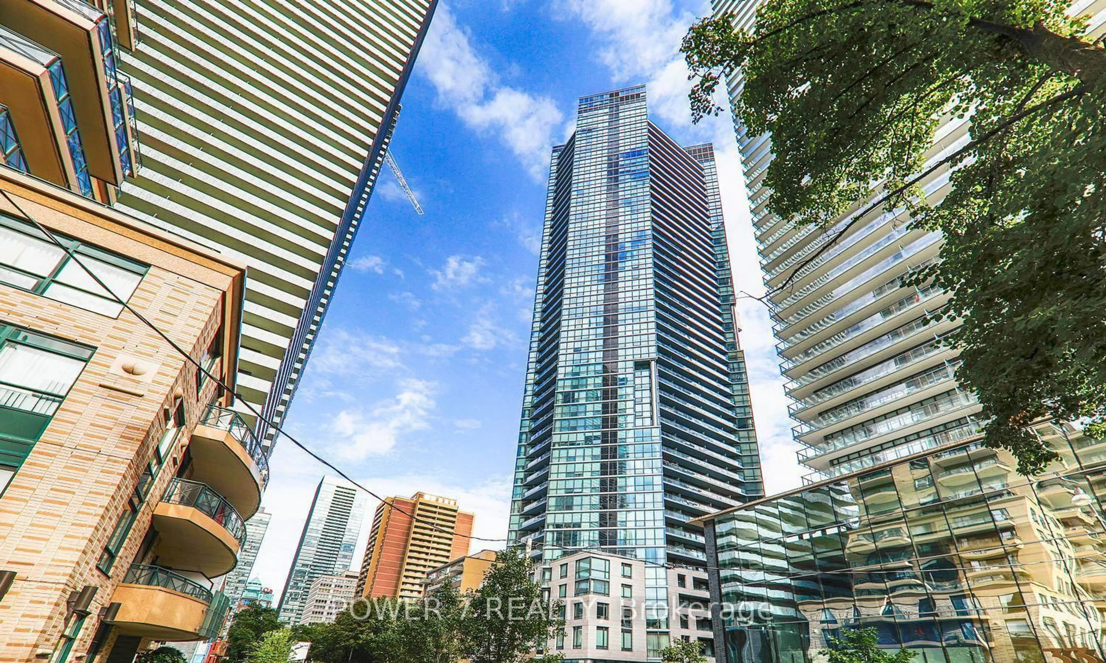Patio, city buildings view from balcony for 45 Charles St #1806, Toronto Ontario M4Y 1S2
