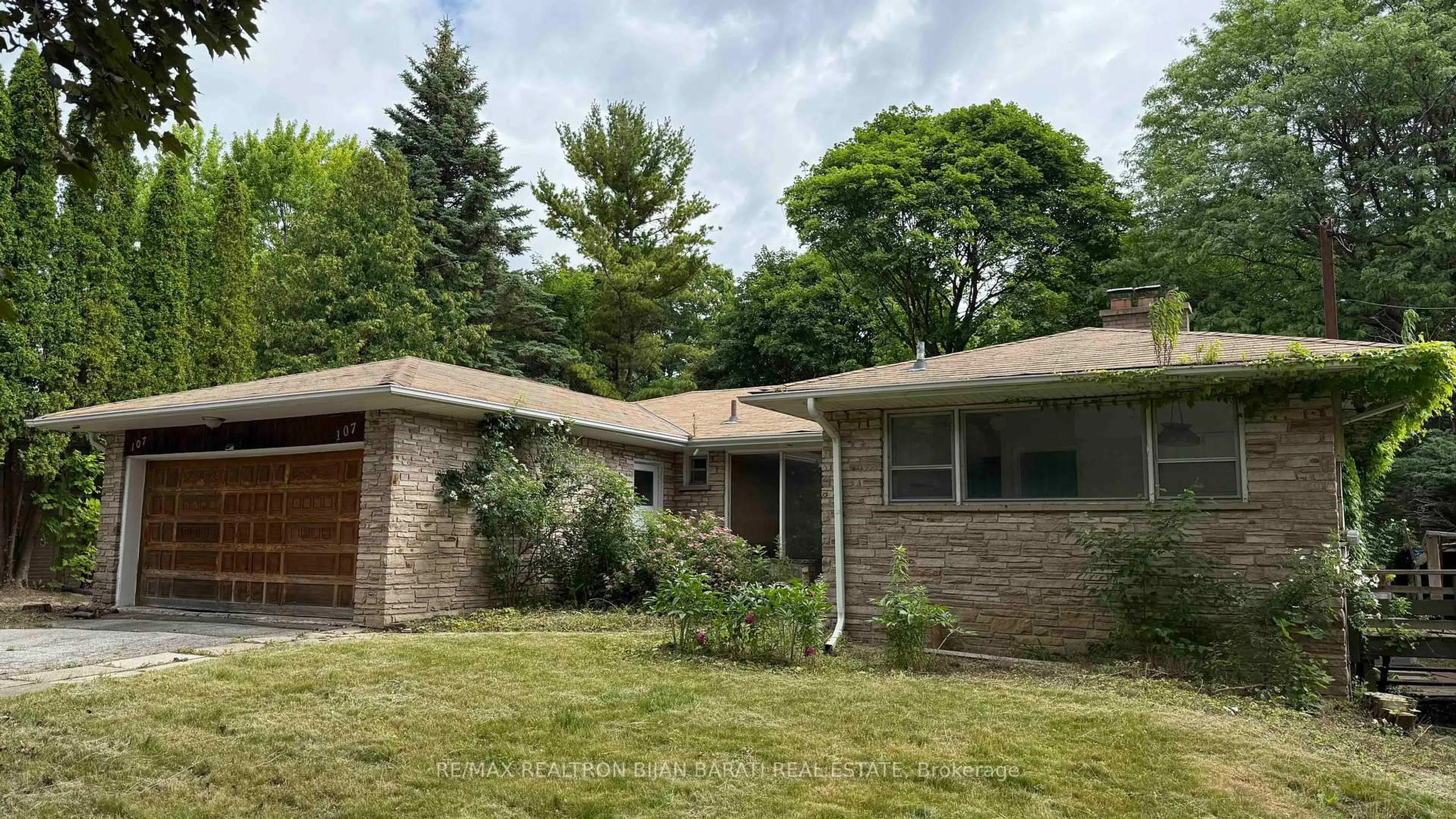 Home with brick exterior material, street for 107 Burbank Dr, Toronto Ontario M2K 1N6