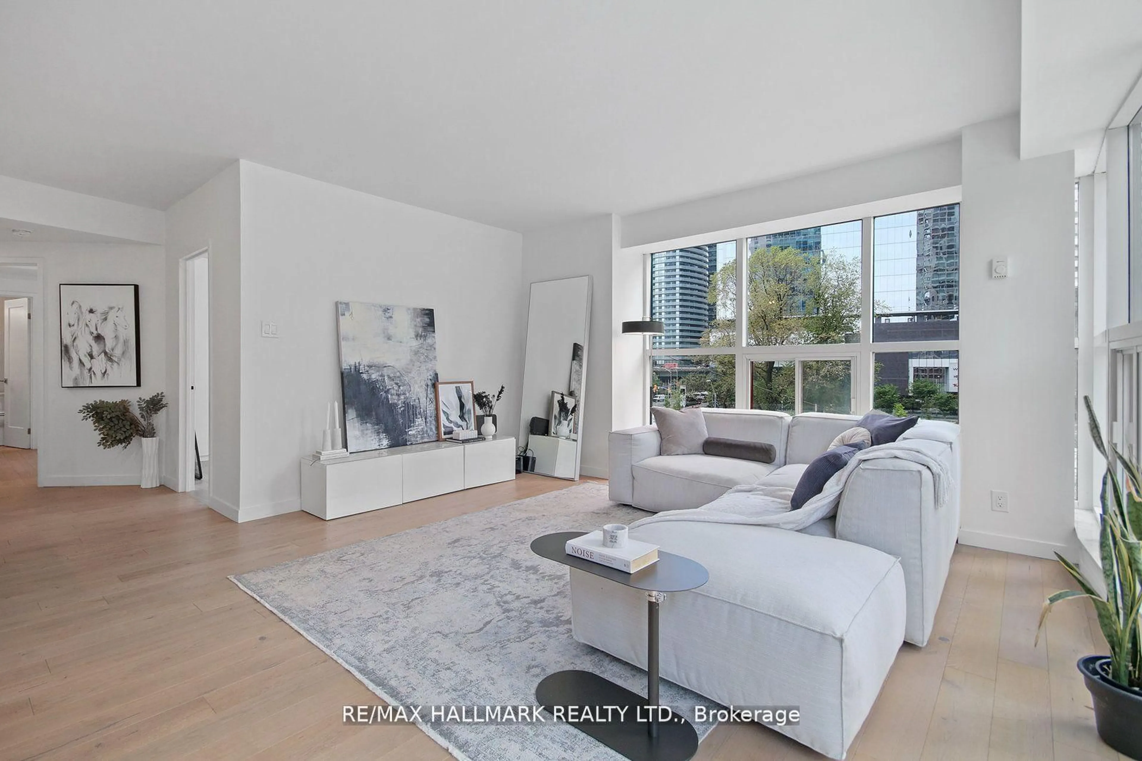 Living room with furniture, unknown for 77 Harbour Sq #502, Toronto Ontario M5J 2S2