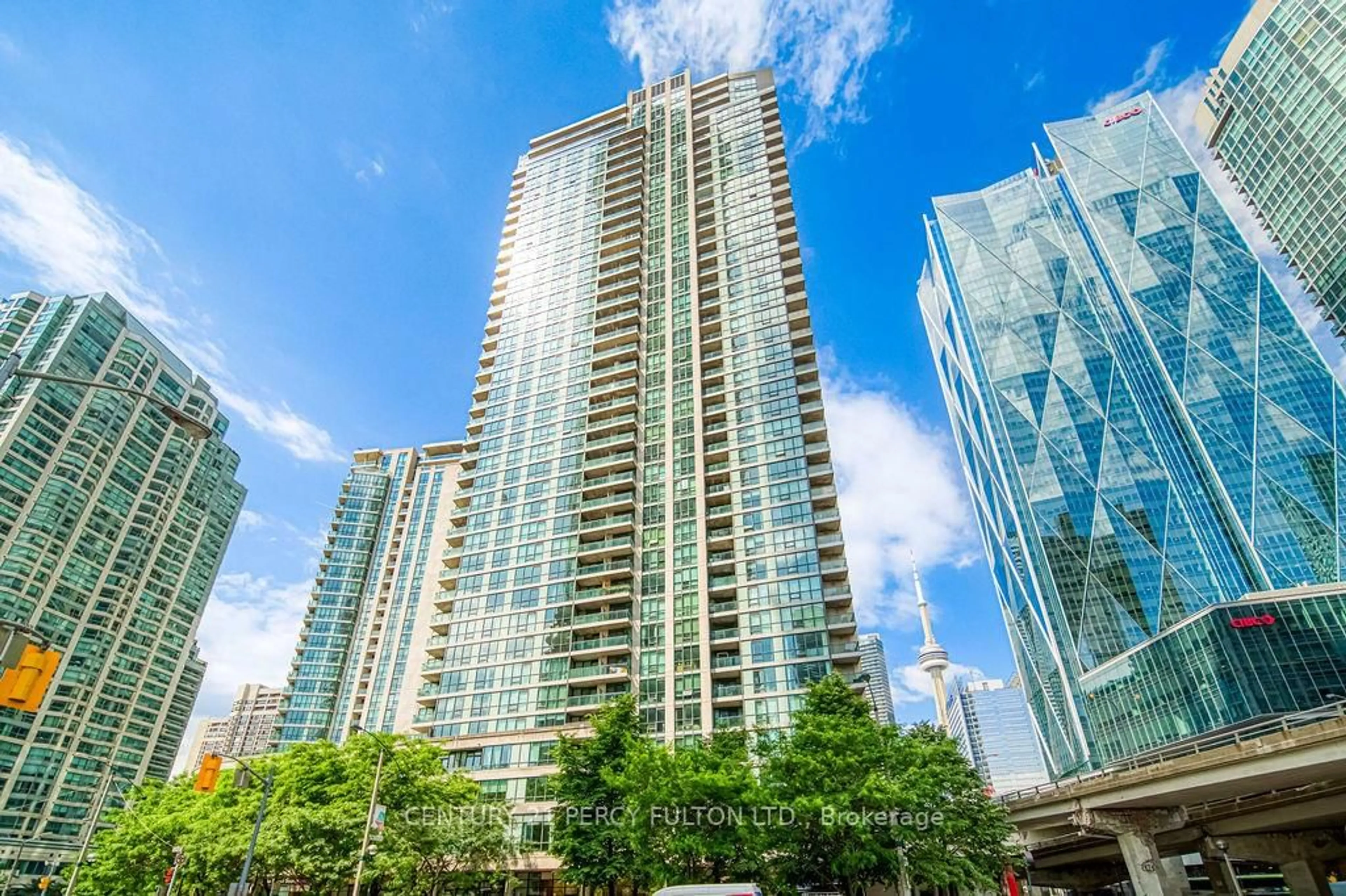 Patio, city buildings view from balcony for 16 Yonge St #3407, Toronto Ontario M5E 1Z9