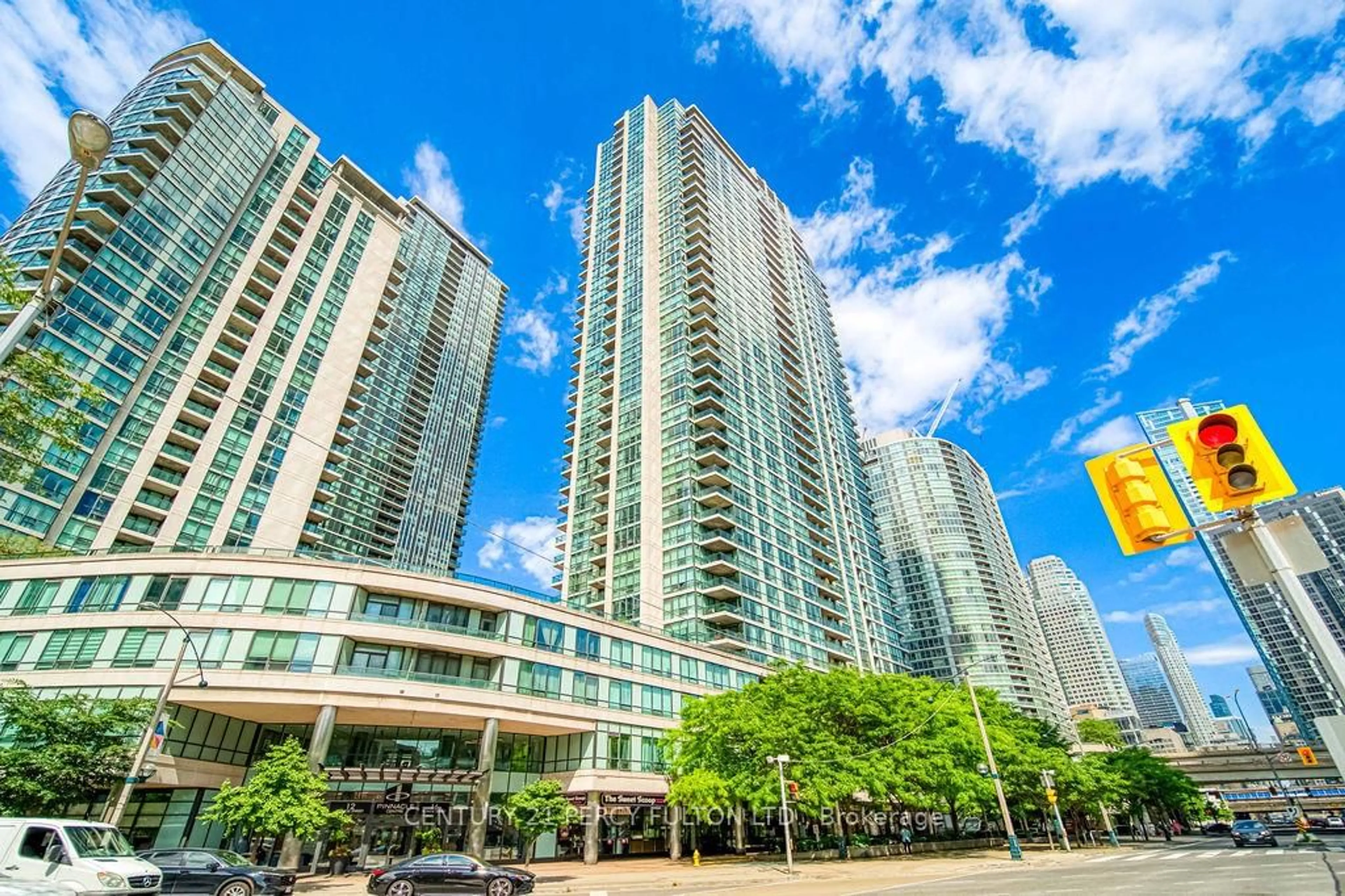 Patio, city buildings view from balcony for 16 Yonge St #3407, Toronto Ontario M5E 1Z9