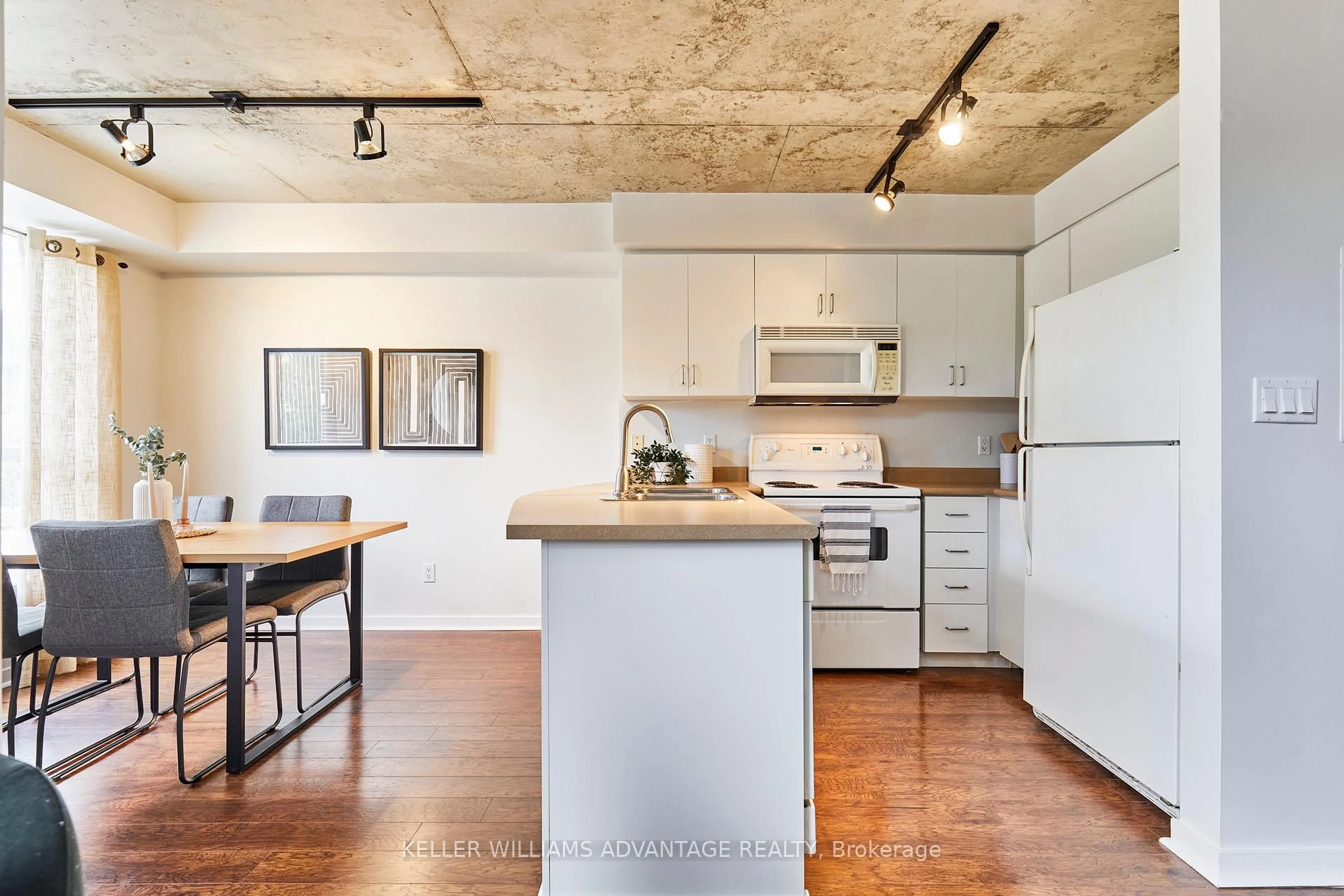 Open concept kitchen, cement floor for 800 King St #201, Toronto Ontario M5V 3M7