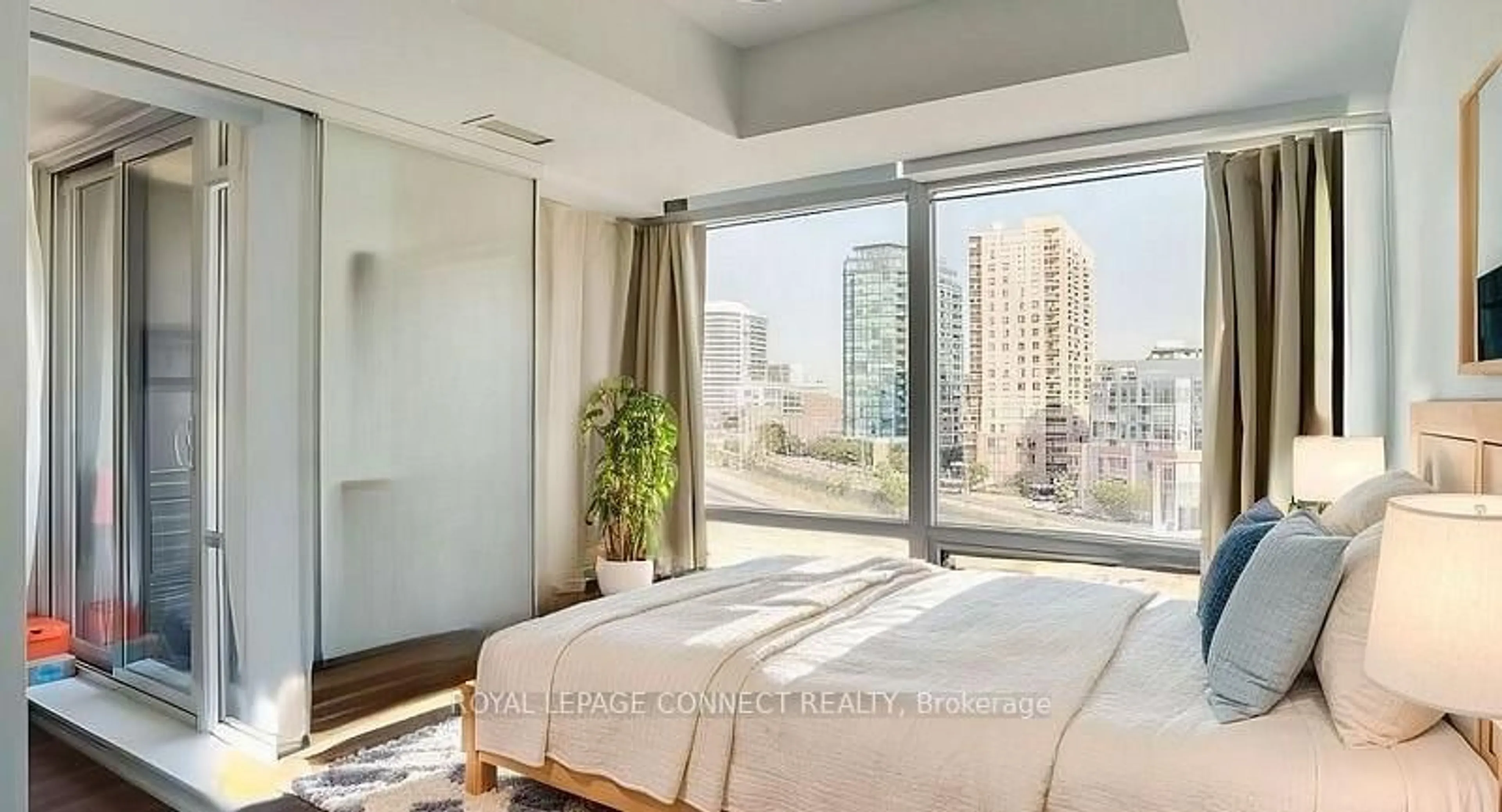 Bedroom with bed, unknown for 20 Joe Shuster Way #702, Toronto Ontario M6K 0A3